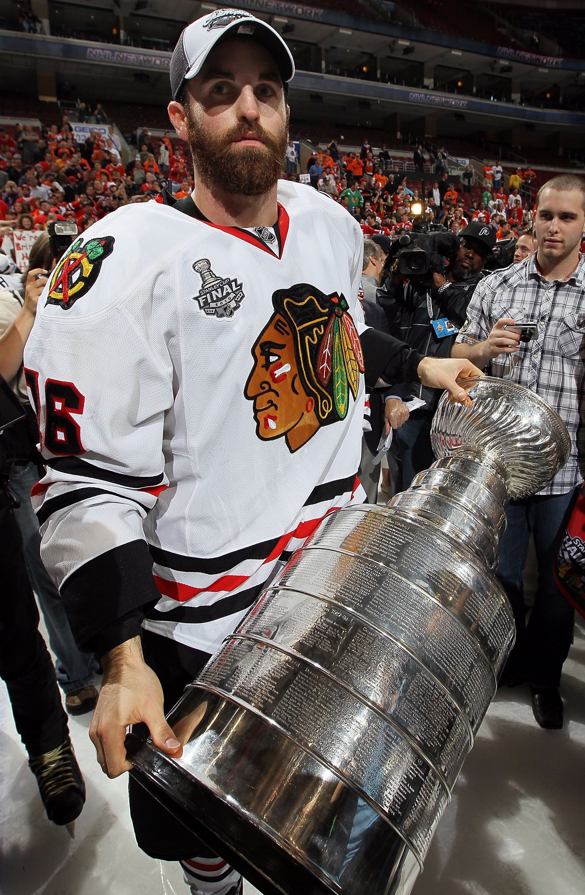 PHILADELPHIA - JUNE 09:  Andrew Ladd #16 of the Chicago Blackhawks hoists the Stanley Cup after teammate Patrick Kane scored the game-winning goal in overtime to defeat the Philadelphia Flyers 4-3 and win the Stanley Cup in Game Six of the 2010 NHL Stanle