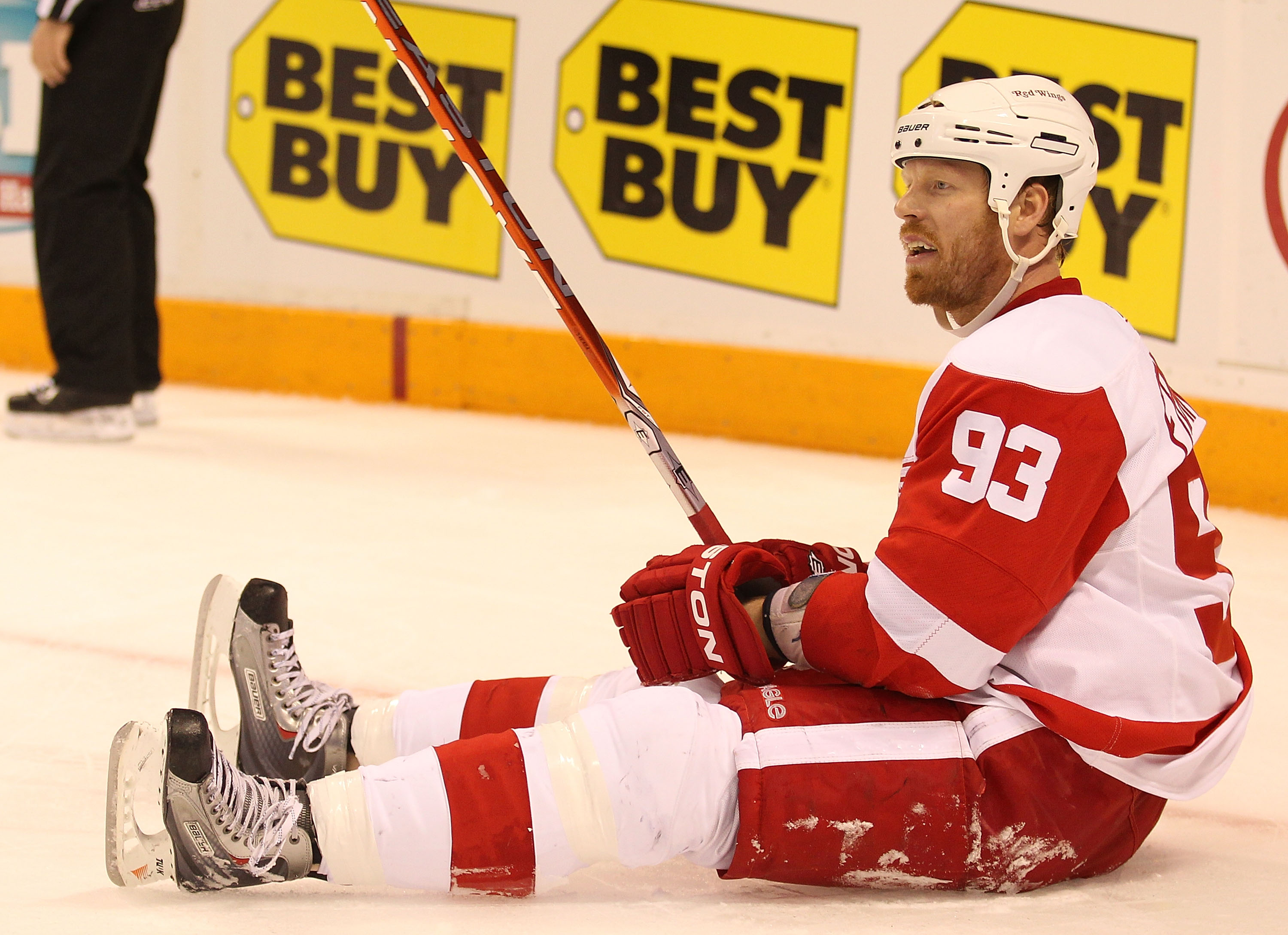 SAN JOSE, CA - MAY 08:  Johan Franzen #93 of the Detroit Red Wings lies on the ice against the San Jose Sharks skates in Game Five of the Western Conference Semifinals during the 2010 NHL Stanley Cup Playoffs at HP Pavilion on May 8, 2010 in San Jose, Cal