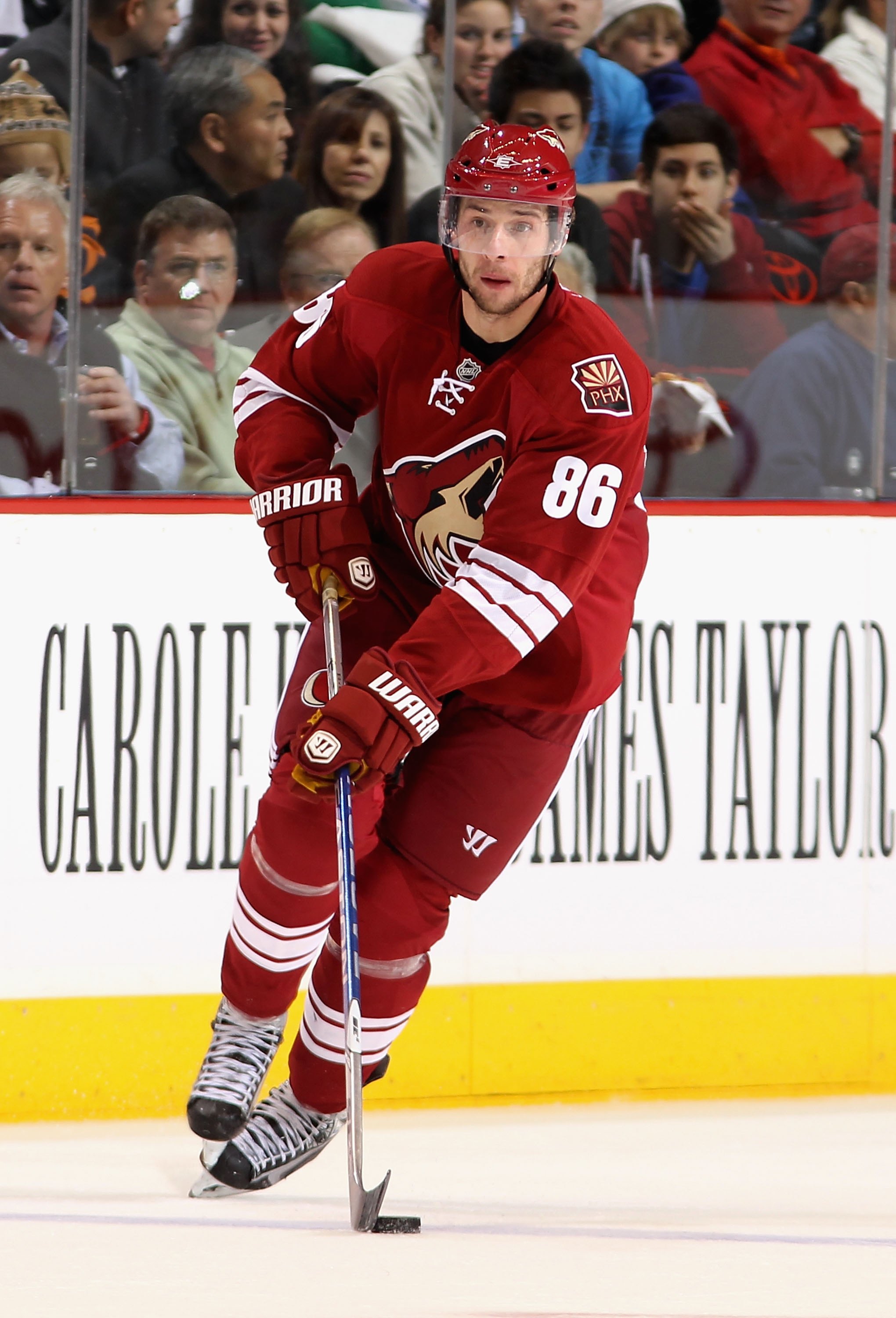 GLENDALE, AZ - MARCH 10:  Wojtek Wolski #86 of the Phoenix Coyotes skates with the puck during the NHL game against the Vancouver Canucks at Jobing.com Arena on March 10, 2010 in Glendale, Arizona.  The Coyotes defeated the Canucks 4-3 in an overtime shoo