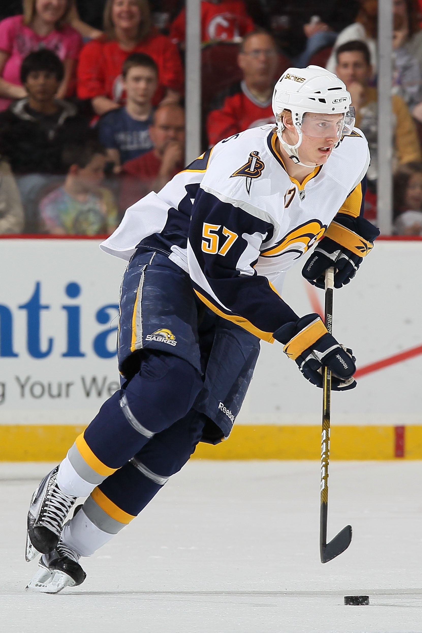 NEWARK, NJ - APRIL 11:  Tyler Myers #57 of the Buffalo Sabres attacks against the New Jersey Devils at the Prudential Center on April 11, 2010 in Newark, New Jersey.  (Photo by Chris McGrath/Getty Images)