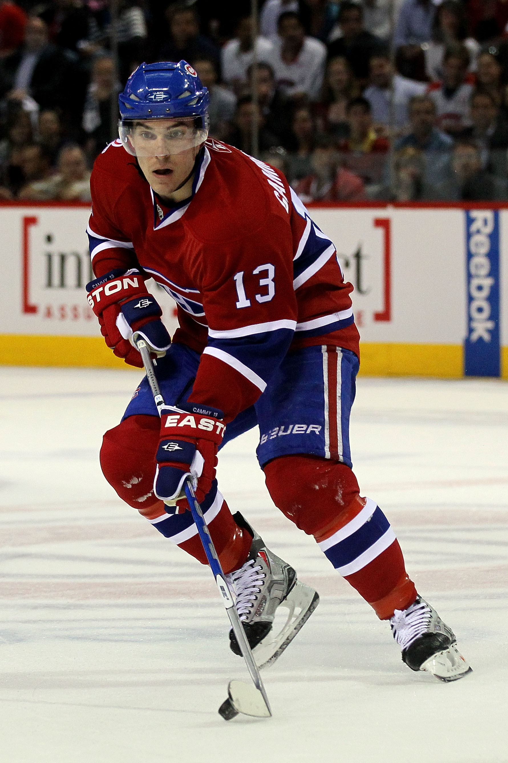 MONTREAL, QC - MAY 20:  Mike Cammalleri #13 of the Montreal Canadiens handles the puck against the Philadelphia Flyers in Game 3 of the Eastern Conference Finals during the 2010 NHL Stanley Cup Playoffs at Bell Centre on May 20, 2010 in Montreal, Canada.