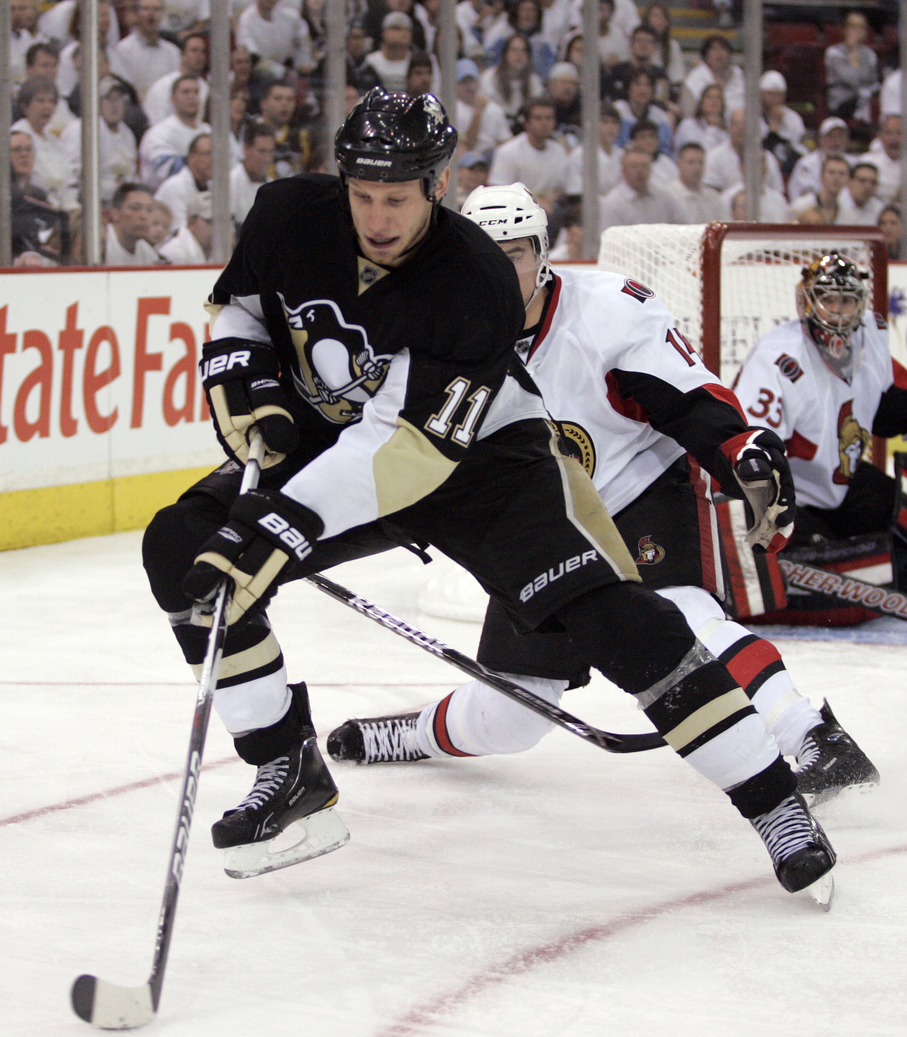 PITTSBURGH - APRIL 22:  Jordan Staal #11 of the Pittsburgh Penguins handles the puck against the Ottawa Senators in Game Five of the Eastern Conference Quarterfinals during the 2010 NHL Stanley Cup Playoffs at Mellon Arena on April 22, 2010 in Pittsburgh,