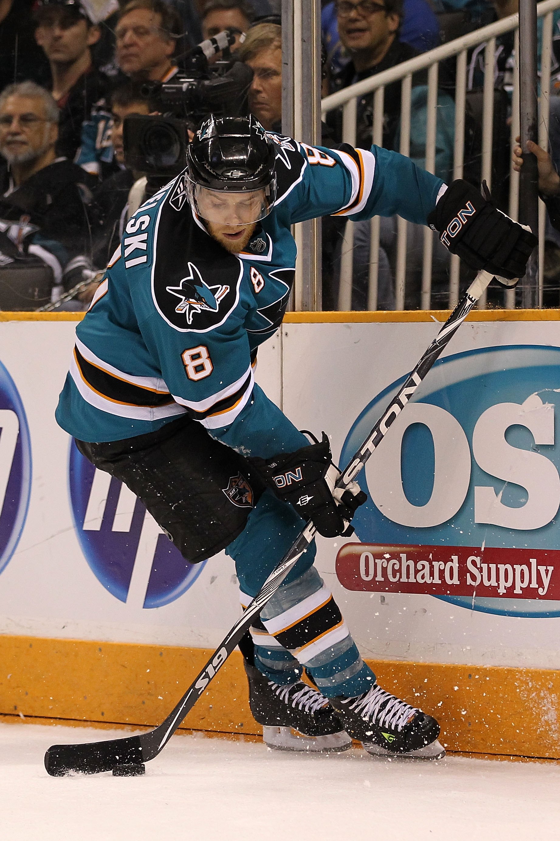 SAN JOSE, CA - MAY 16:  Joe Pavelski #8 of the San Jose Sharks moves the puck while taking on the Chicago Blackhawks in Game One of the Western Conference Finals during the 2010 NHL Stanley Cup Playoffs at HP Pavilion on May 16, 2010 in San Jose, Californ