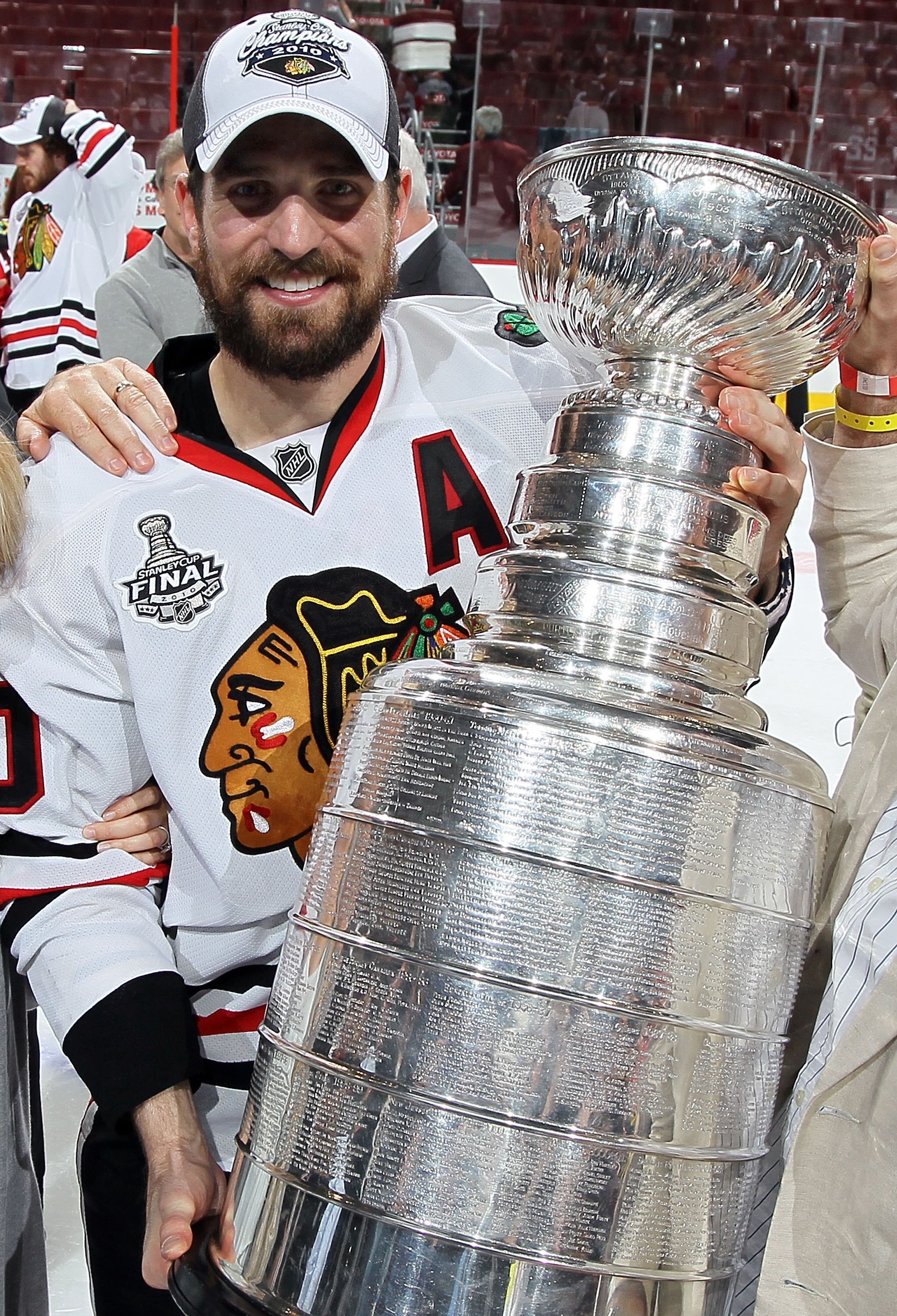 PHILADELPHIA - JUNE 09:  Patrick Sharp #10 of the Chicago Blackhawks hoists the Stanley Cup after teammate Patrick Kane scored the game-winning goal in overtime to defeat the Philadelphia Flyers 4-3 and win the Stanley Cup in Game Six of the 2010 NHL Stan