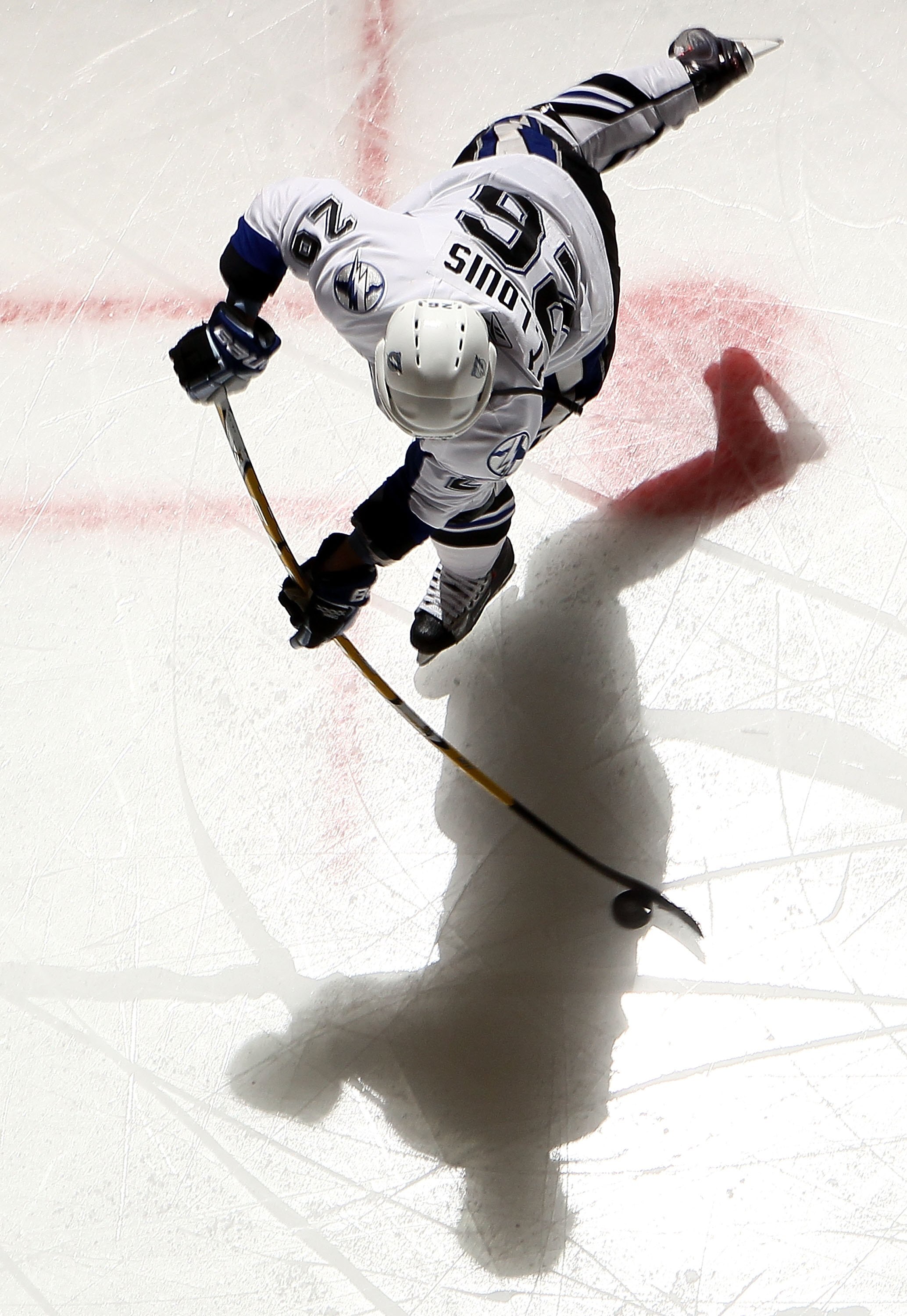 UNIONDALE, NY - FEBRUARY 13:  Martin St. Louis #26 of the Tampa Bay Lightning warms up before playing against the New York Islanders on February 13, 2010 at Nassau Coliseum in Uniondale, New York.  (Photo by Jim McIsaac/Getty Images)