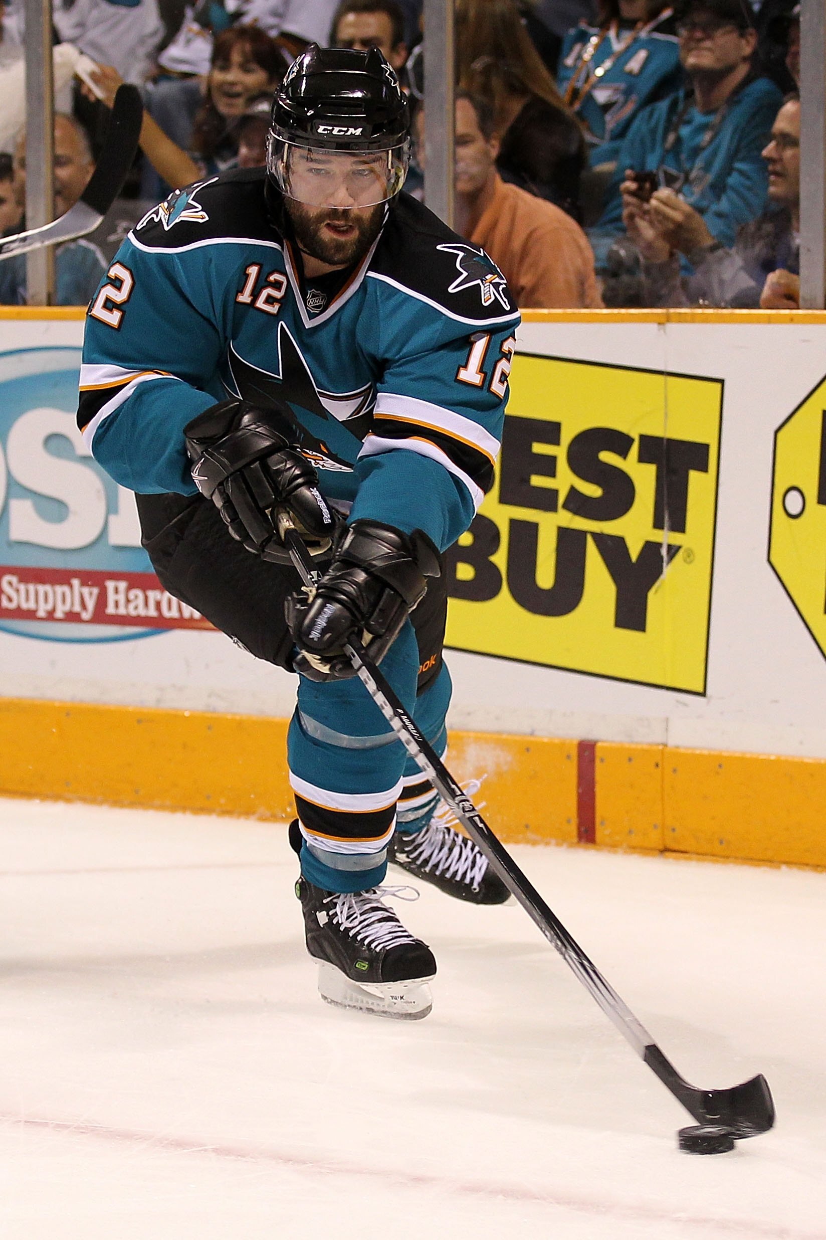 SAN JOSE, CA - MAY 18:  Patrick Marleau #12 of the San Jose Sharks moves the puck while taking on the Chicago Blackhawks in Game Two of the Western Conference Finals during the 2010 NHL Stanley Cup Playoffs at HP Pavilion on May 18, 2010 in San Jose, Cali