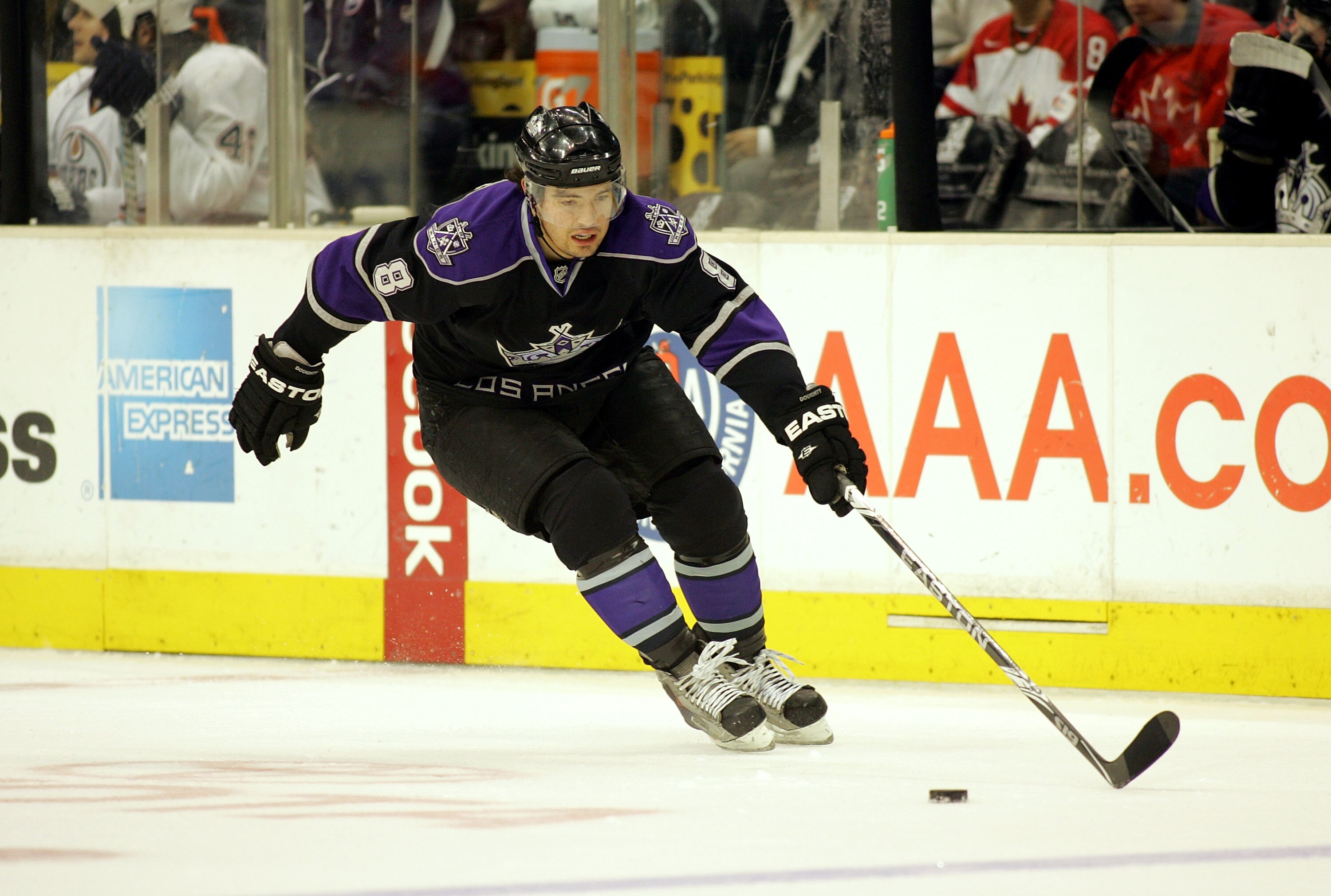 LOS ANGELES, CA - FEBRUARY 11:  Drew Doughty #8 of the Los Angeles Kings reaches with his stick to control the puck on his backhand in the neutral zone during their NHL game against the Edmonton Oilers at the Staples Center on February 11, 2010 in Los Ang