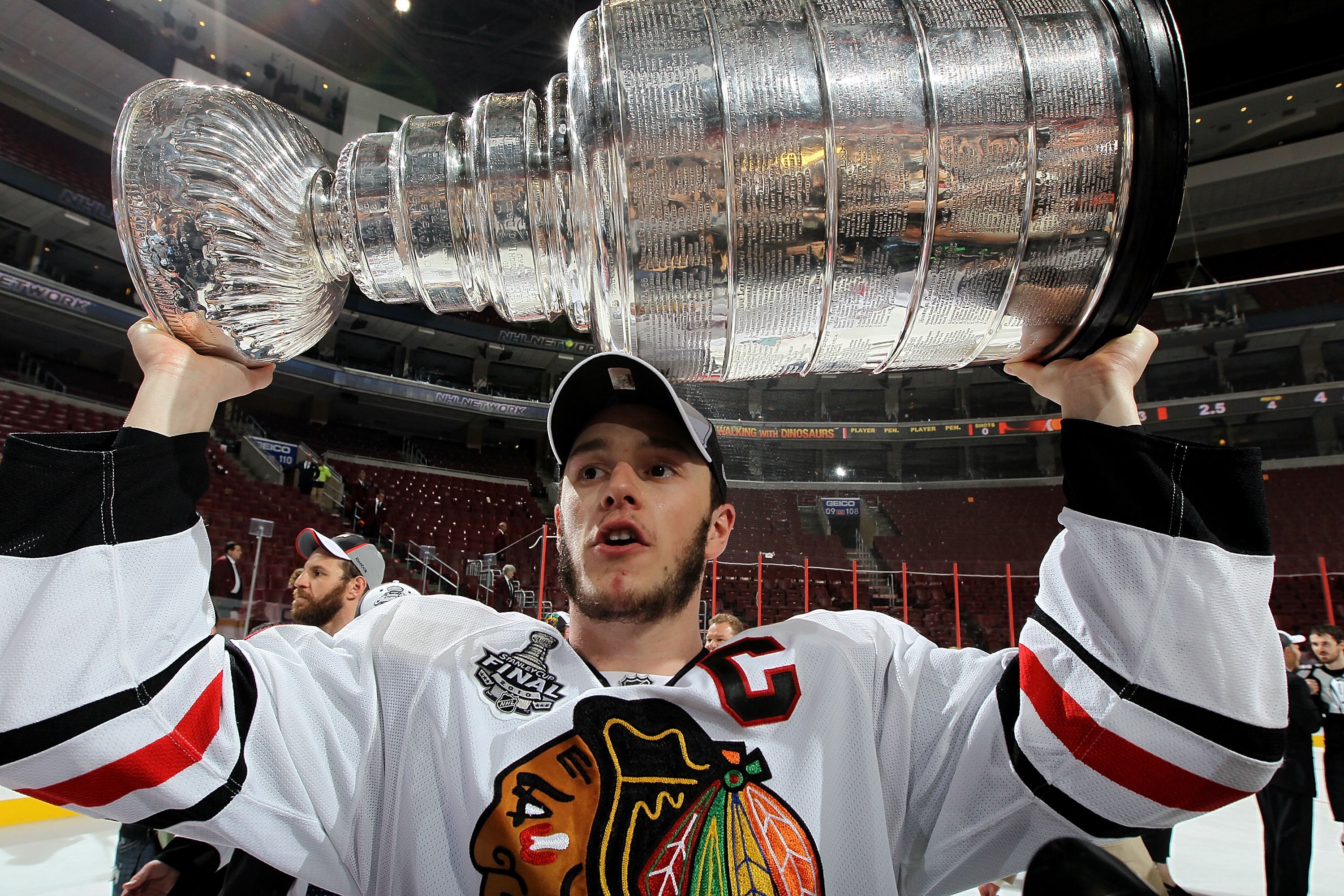 PHILADELPHIA - JUNE 09:  Jonathan Toews #19 of the Chicago Blackhawks hoists the Stanley Cup after teammate Patrick Kane scored the game-winning goal in overtime to defeat the Philadelphia Flyers 4-3 and win the Stanley Cup in Game Six of the 2010 NHL Sta