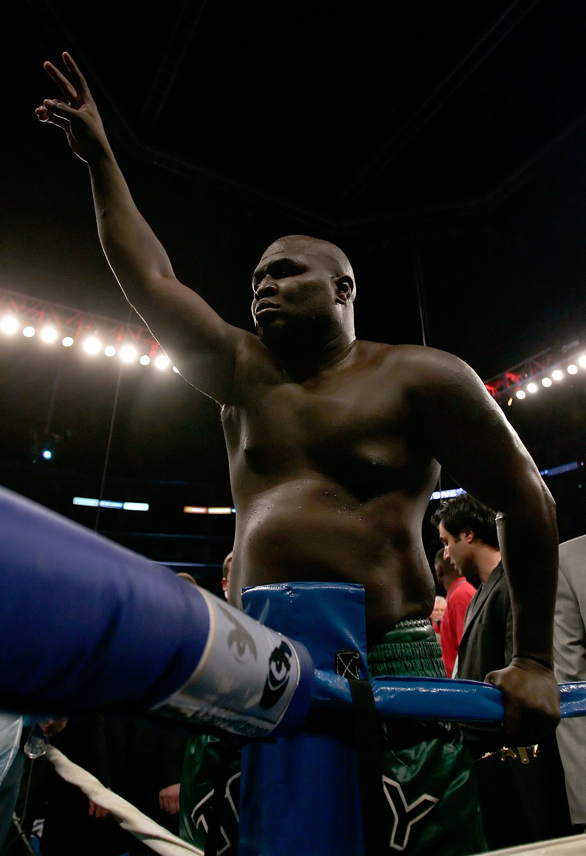 LOS ANGELES, CA - SEPTEMBER 02:  James Toney jumps on the ropes after his fight against Samuel Peter during their WBC heavyweight title elimination/NABF & IBA heavyweight championship fight at Staples Center on September 2, 2006 in Los Angeles, California