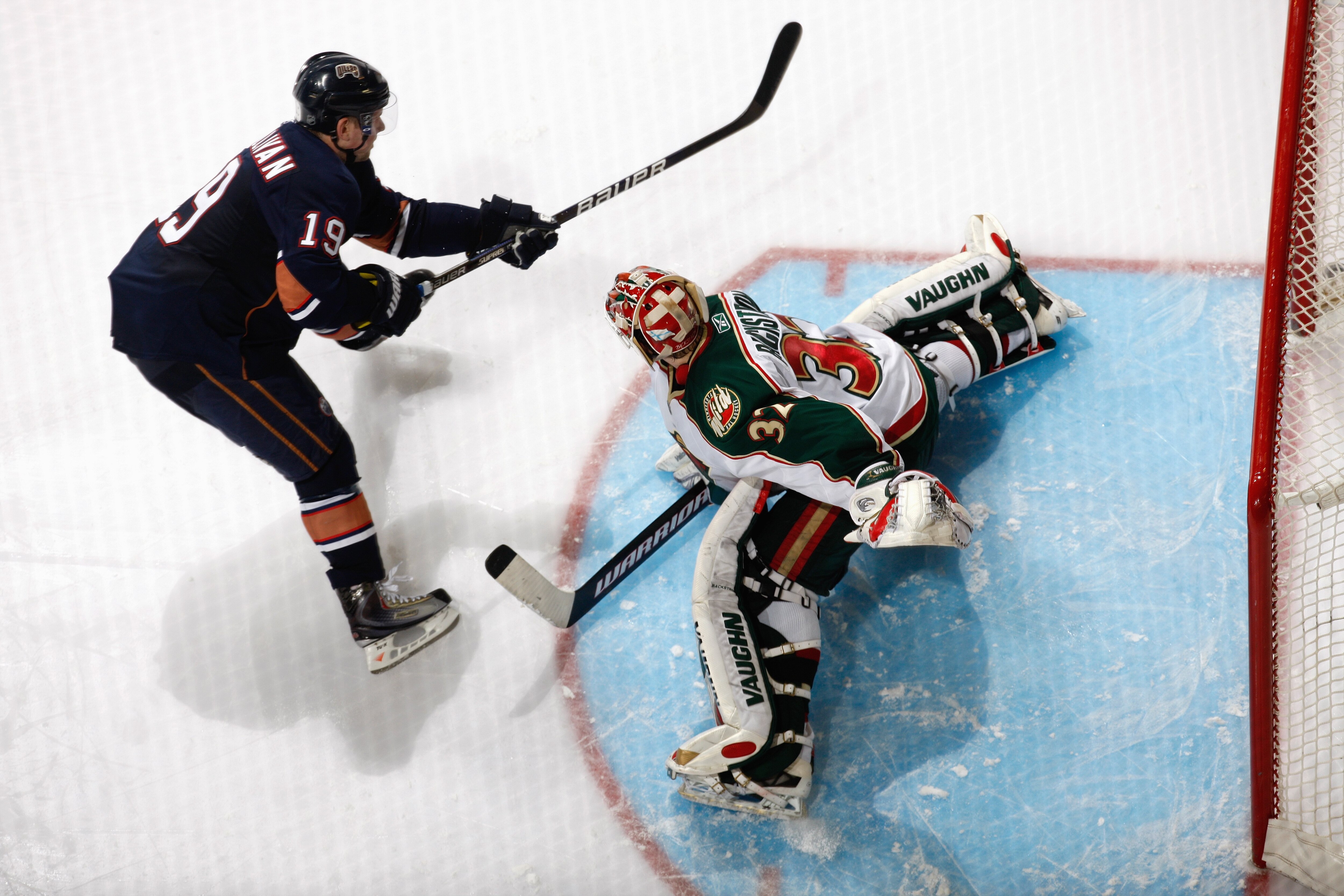 EDMONTON, CANADA - MARCH 5: Patrick O'Sullivan #19 of the Edmonton Oilers shoots the puck against Niklas Backstrom #32 of the Minnesota Wild on March 5, 2010 at Rexall Place in Edmonton, Alberta, Canada. (Photo by Dale MacMillan/Getty Images)