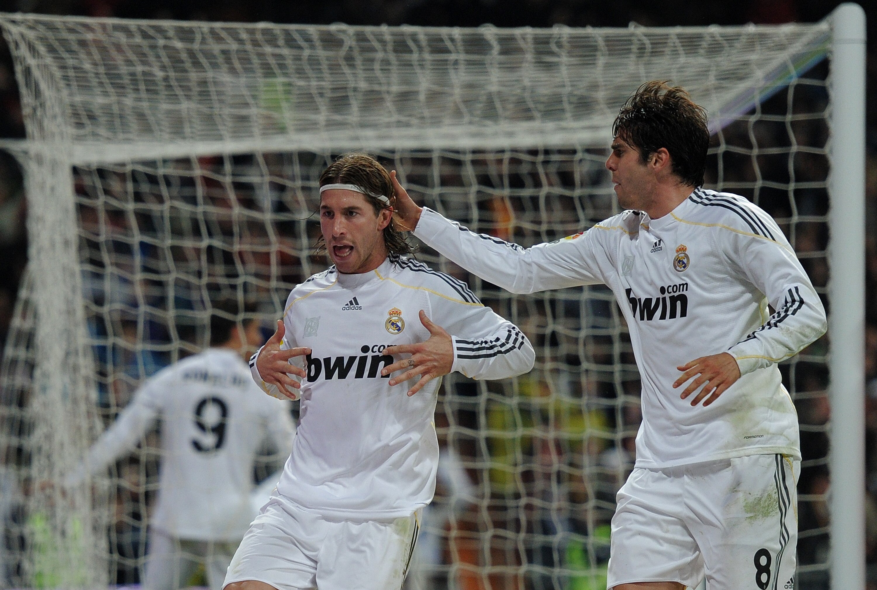 MADRID, SPAIN - MARCH 06:  Sergio Ramos (L) of Real Madrid celebrates scoring his sides equalizing goal with his teammate Kaka during the La Liga match between Real Madrid and Sevilla at the Estadio Santiago Bernabeu on March 6, 2010 in Madrid, Spain. Rea