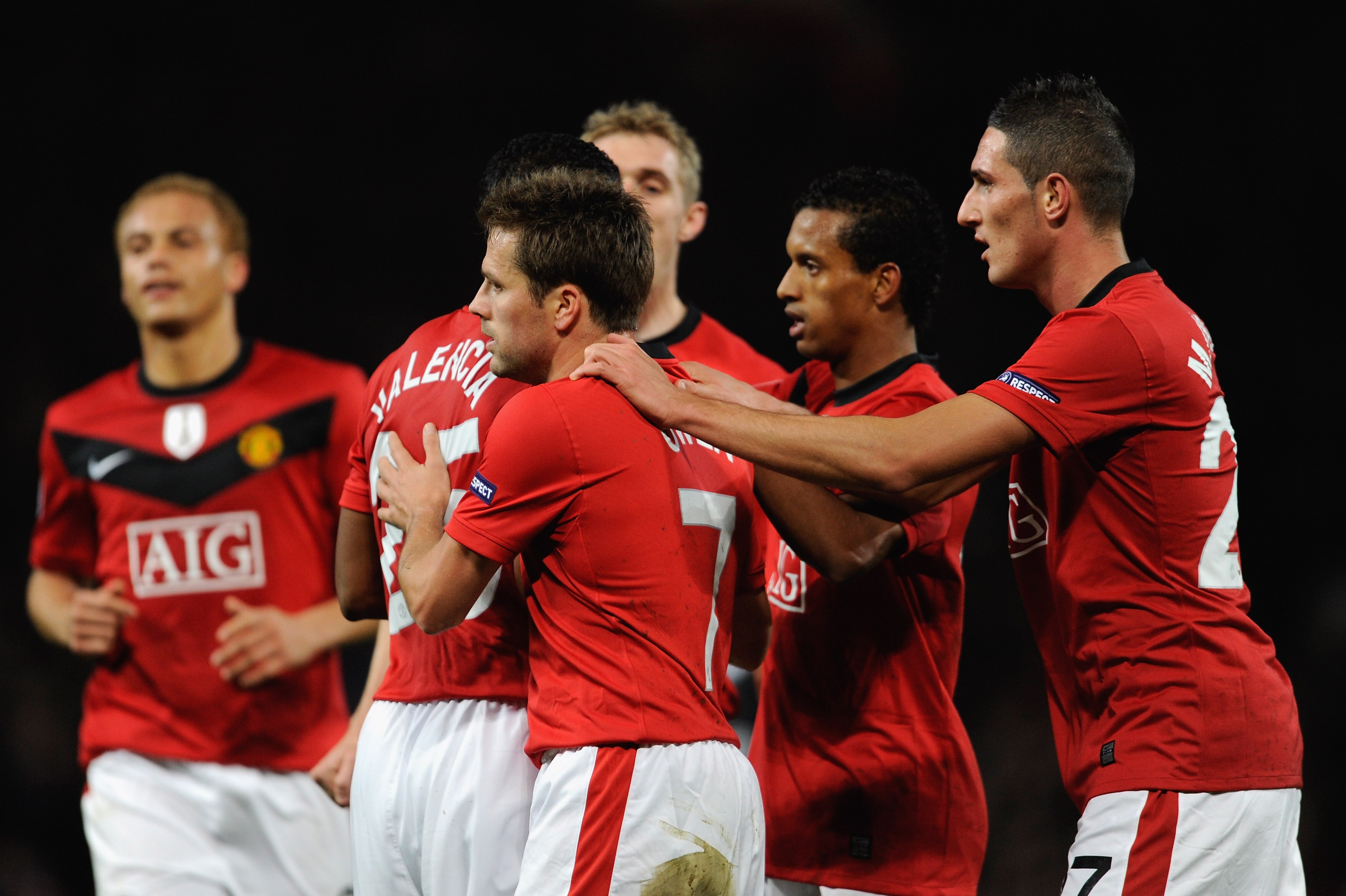 MANCHESTER, ENGLAND - NOVEMBER 03:  Michael Owen of Manchester United is congratulated by his team mates after scoring his team's first goal during the UEFA Champions League Group B match between Manchester United and CSKA Moscow at Old Trafford on Novemb