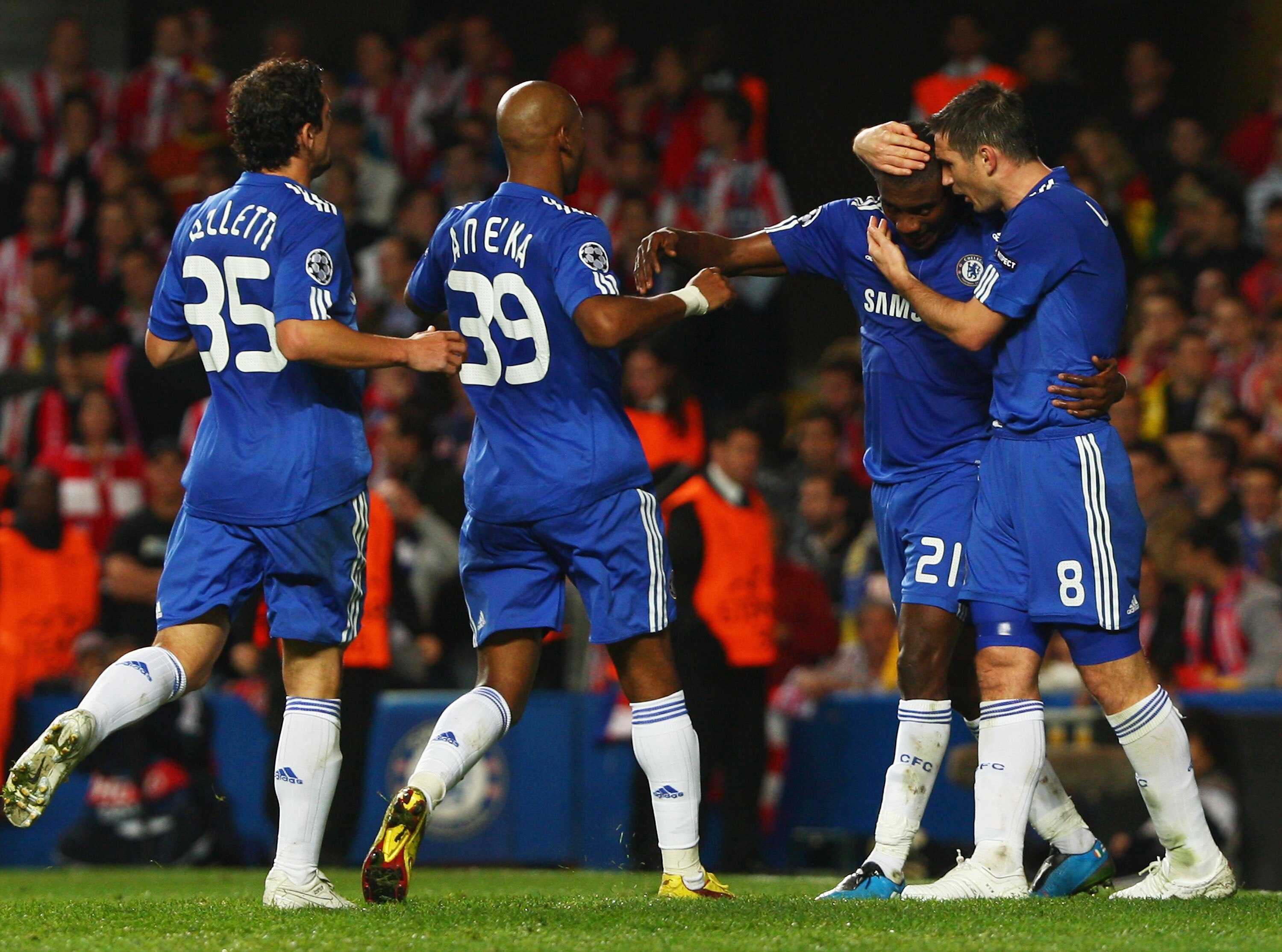 LONDON - OCTOBER 21:  Salomon Kalou of Chelsea (2R)celebrates with Frank Lampard (8), Nicolas Anelka (39) and Juliano Belletti  (35) as he scores their first goal during the UEFA Champions League Group D match between Chelsea and Atletico Madrid at Stamfo