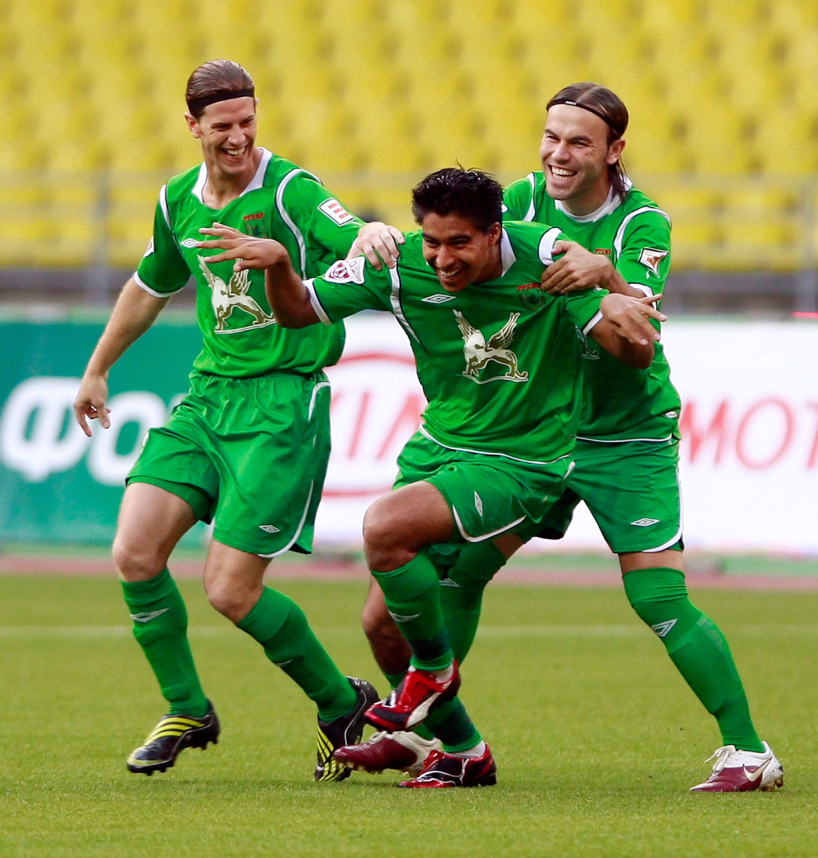 MOSCOW, RUSSIA - JULY 17: Christian Noboa (C) of FC Rubin Kazan celebrates after scoring a goal during the Russian Football League Championship match between FC Spartak Moscow and FC Rubin Kazan at the Luzhniki Stadium on July 17, 2010 in Moscow, Russia.