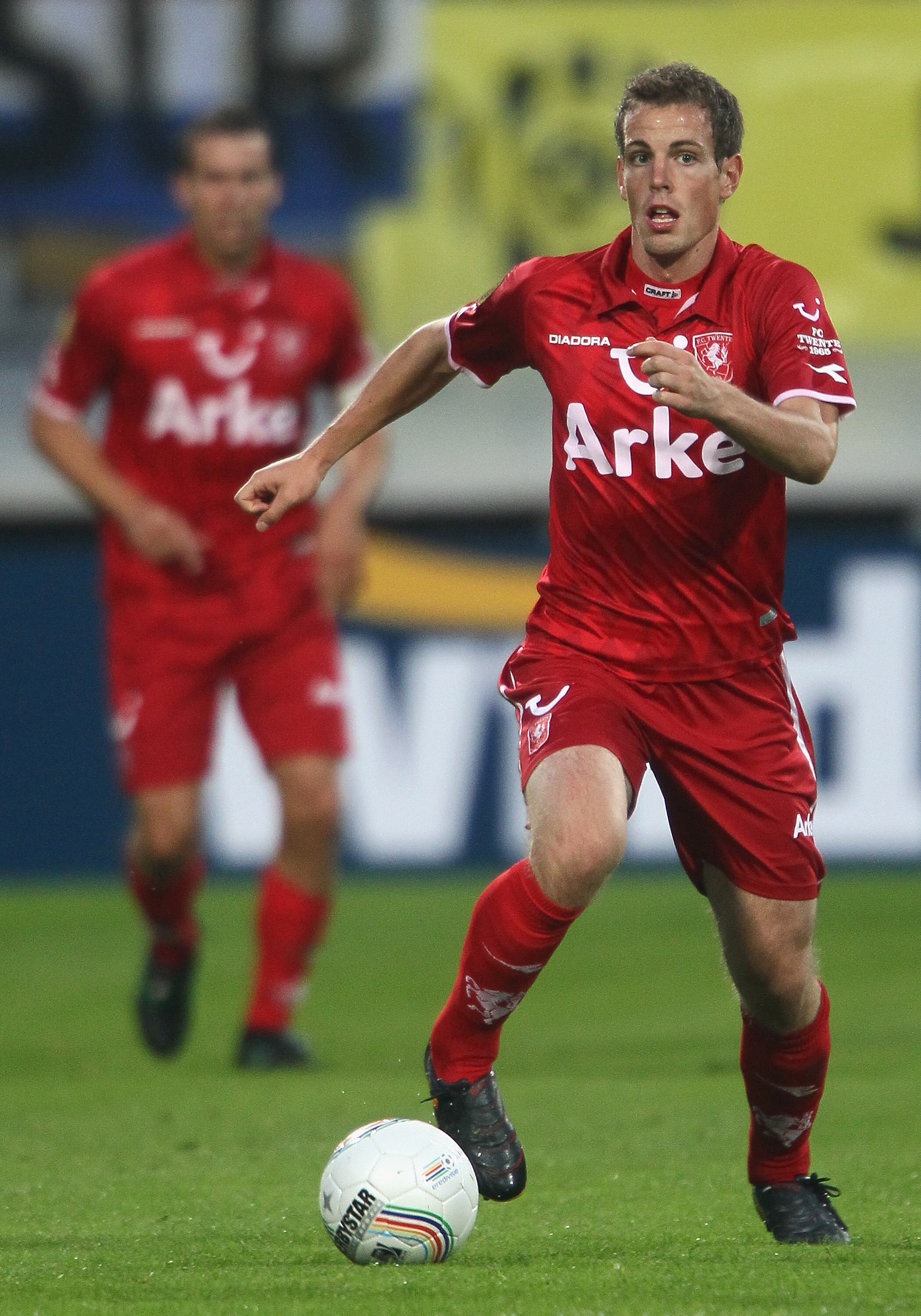 KERKRADE, NETHERLANDS - AUGUST 06:  Wout Brama of Enschede runs with the ball during the Eredivisie match between Roda and Twente at Parkstad Limburg stadium on August 6, 2010 in Kerkrade, Netherlands.  (Photo by Christof Koepsel/Getty Images)
