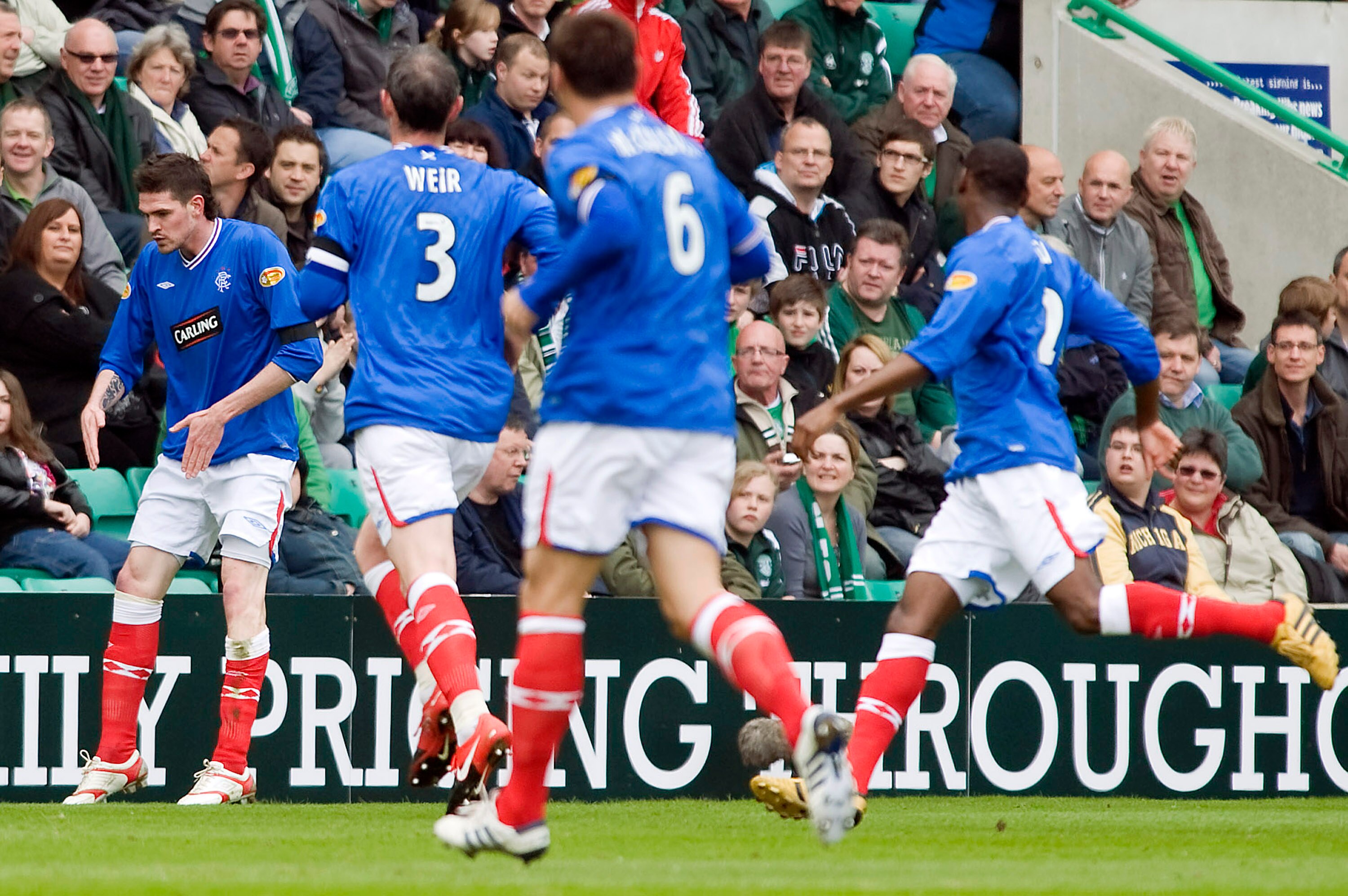 EDINBURGH, SCOTLAND - APRIL 25:  Rangers striker Kyle Lafferty (L)  celebrates his opening goal during the Clydesdale Bank Scottish Premier League match between Hibernian and Rangers at Easter Road, on April 25, 2010 in Edinburgh, Scotland. (Photo by Watt