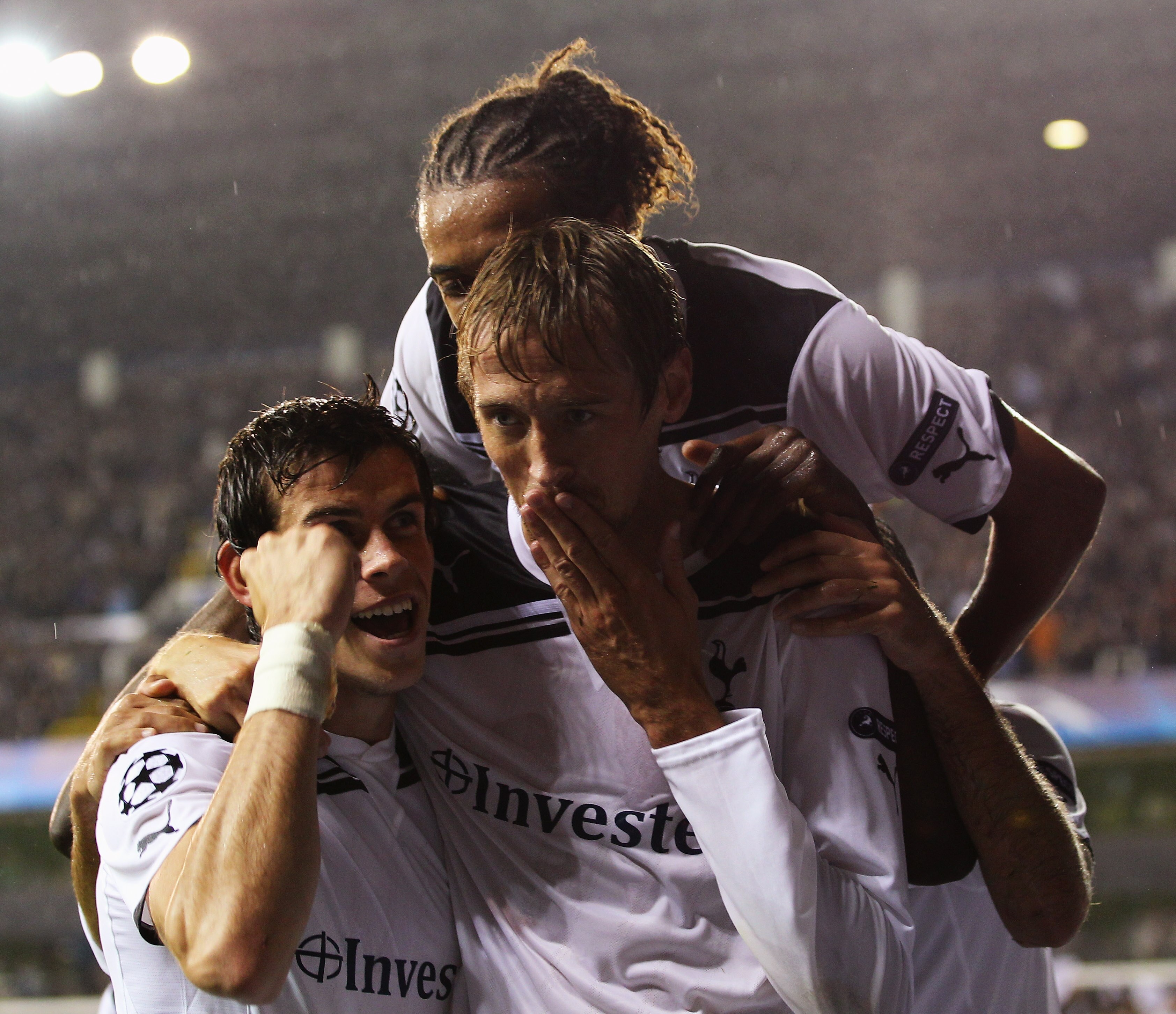 LONDON, ENGLAND - AUGUST 25:  Peter Crouch of Tottenham Hotspur celebrates with team mates as he scores their thrid goal during the UEFA Champions League play-off second leg match between Tottenham Hotspur and BSC Young Boys at White Hart Lane on August 2
