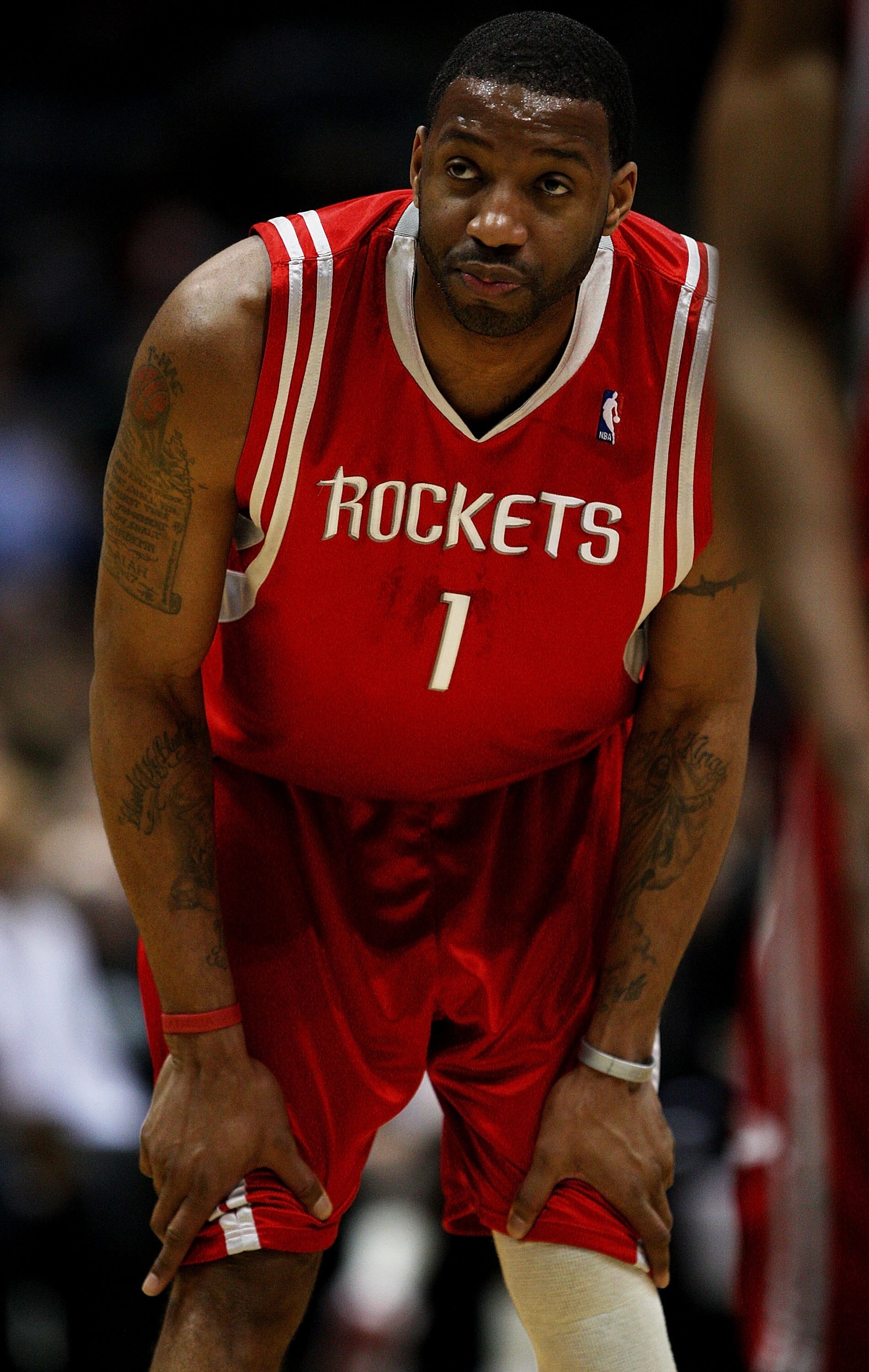 MILWAUKEE - FEBRUARY 09: Tracy McGrady #1 of the Houston Rockets watches as a teammate shoots a free-throw against the Milwaukee Bucks on February 9, 2009 at the Bradley Center in Milwaukee, Wisconsin. The Bucks defeated the Rockets 124-112. NOTE TO USER: