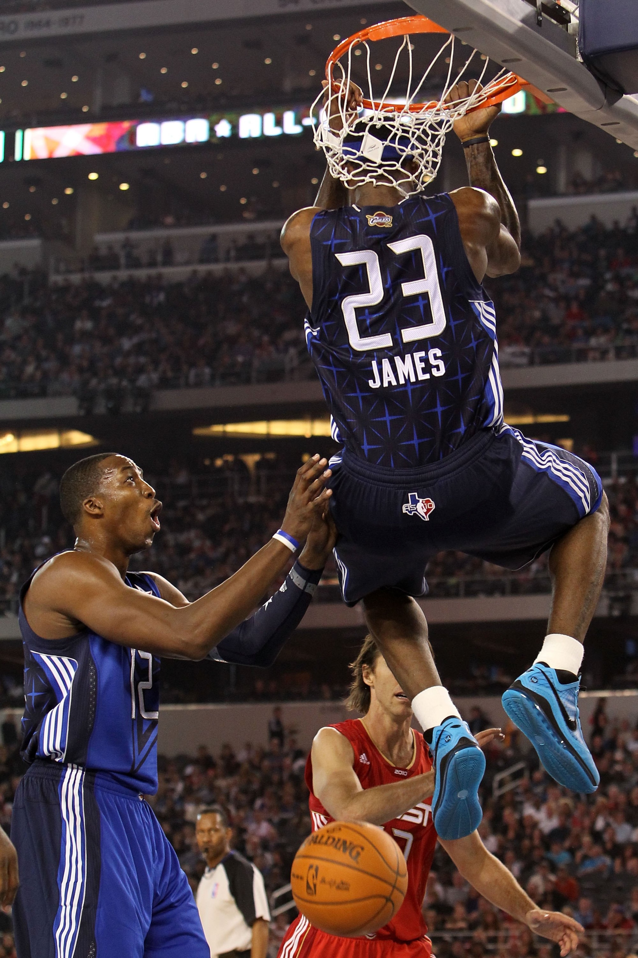 ARLINGTON, TX - FEBRUARY 14: Dwight Howard #12 of the Eastern Conference reacts as LeBron James #23 dunks against the Western Conference during the second half of the NBA All-Star Game, part of 2010 NBA All-Star Weekend at Cowboys Stadium on February 14,