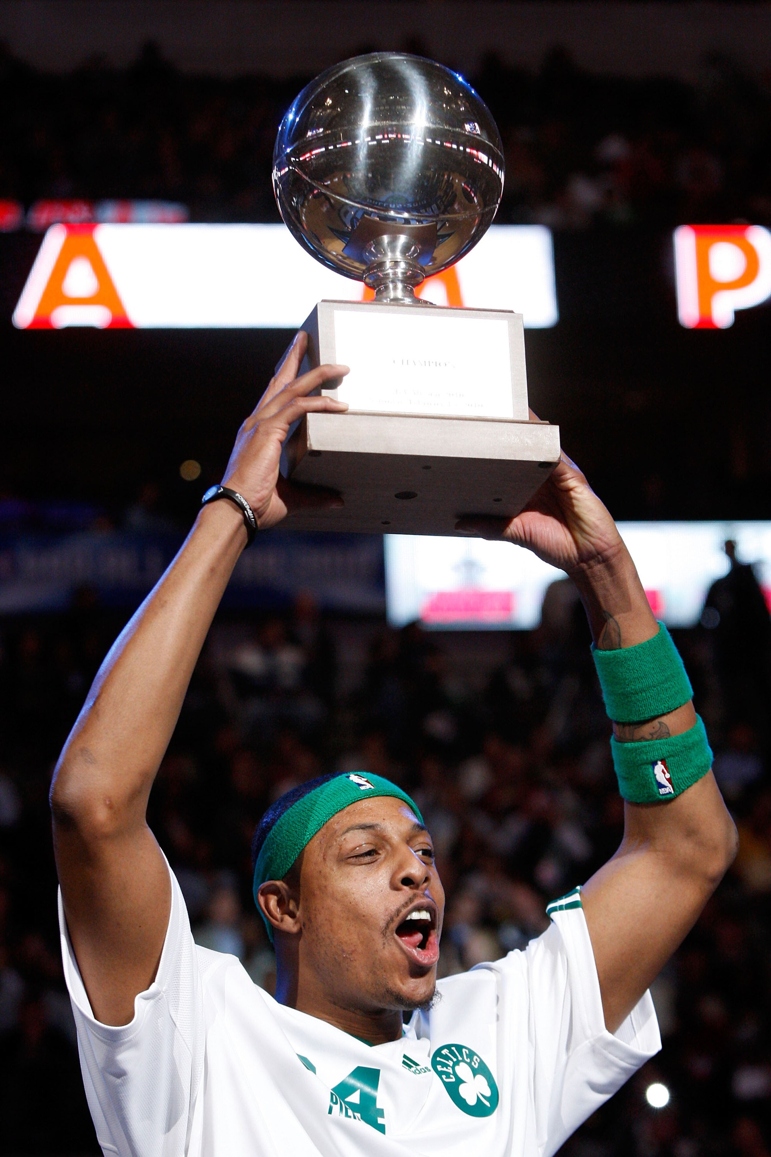 DALLAS - FEBRUARY 13:  Paul Pierce #34 of the Boston Celtics celebrates with the Champions Trophy after winning the Foot Locker Three Point Shootout on All-Star Saturday Night, part of 2010 NBA All-Star Weekend at American Airlines Center on February 13,
