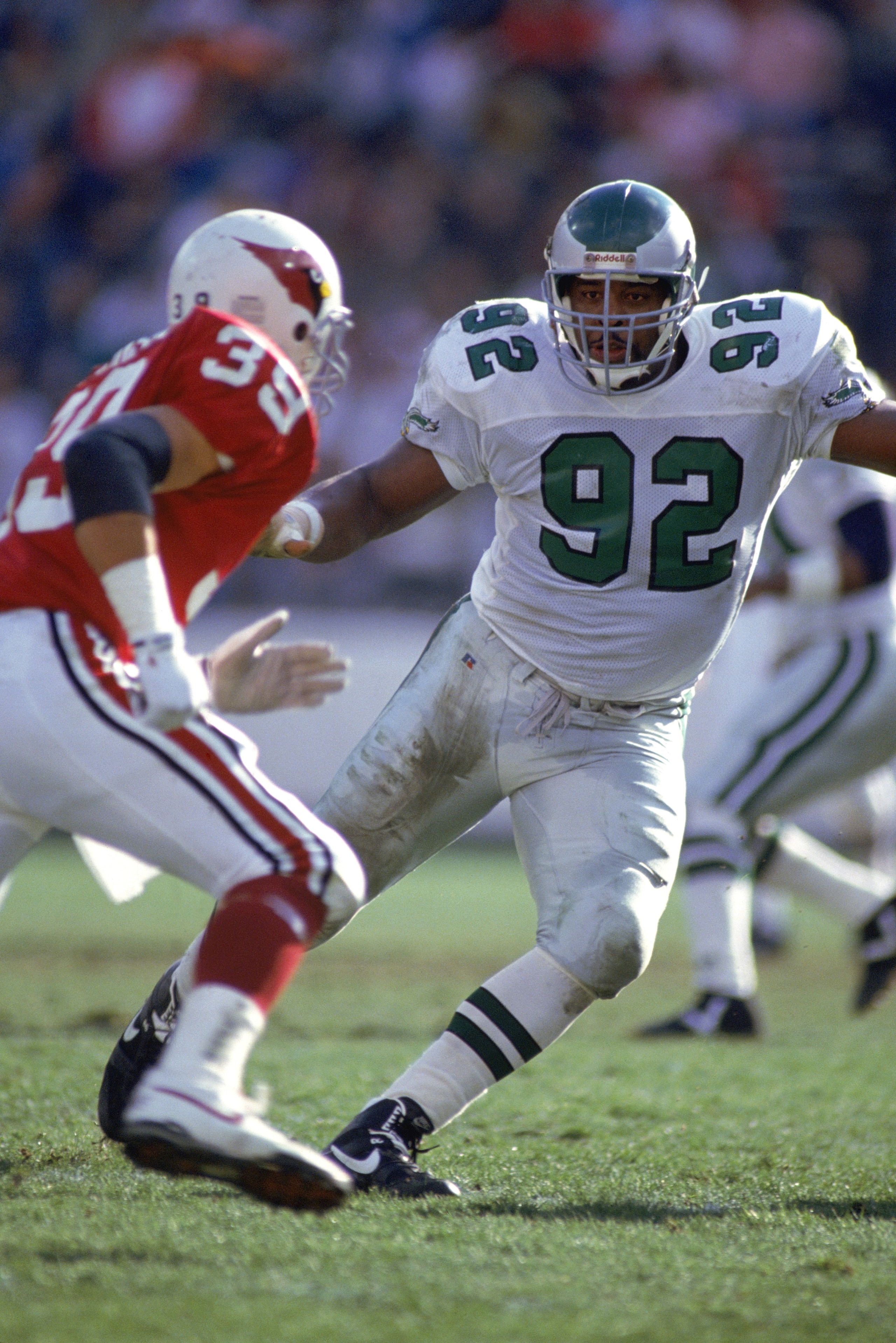 PHOENIX - DECEMBER 22:  Defensive end Reggie White #92 of the Philadelphia Eagles covers his man during a game against the Phoenix Cardinals on December 22, 1990 at Sun Devil Stadium in Phoenix, Arizona. (Photo by Stephen Dunn/Getty Images)