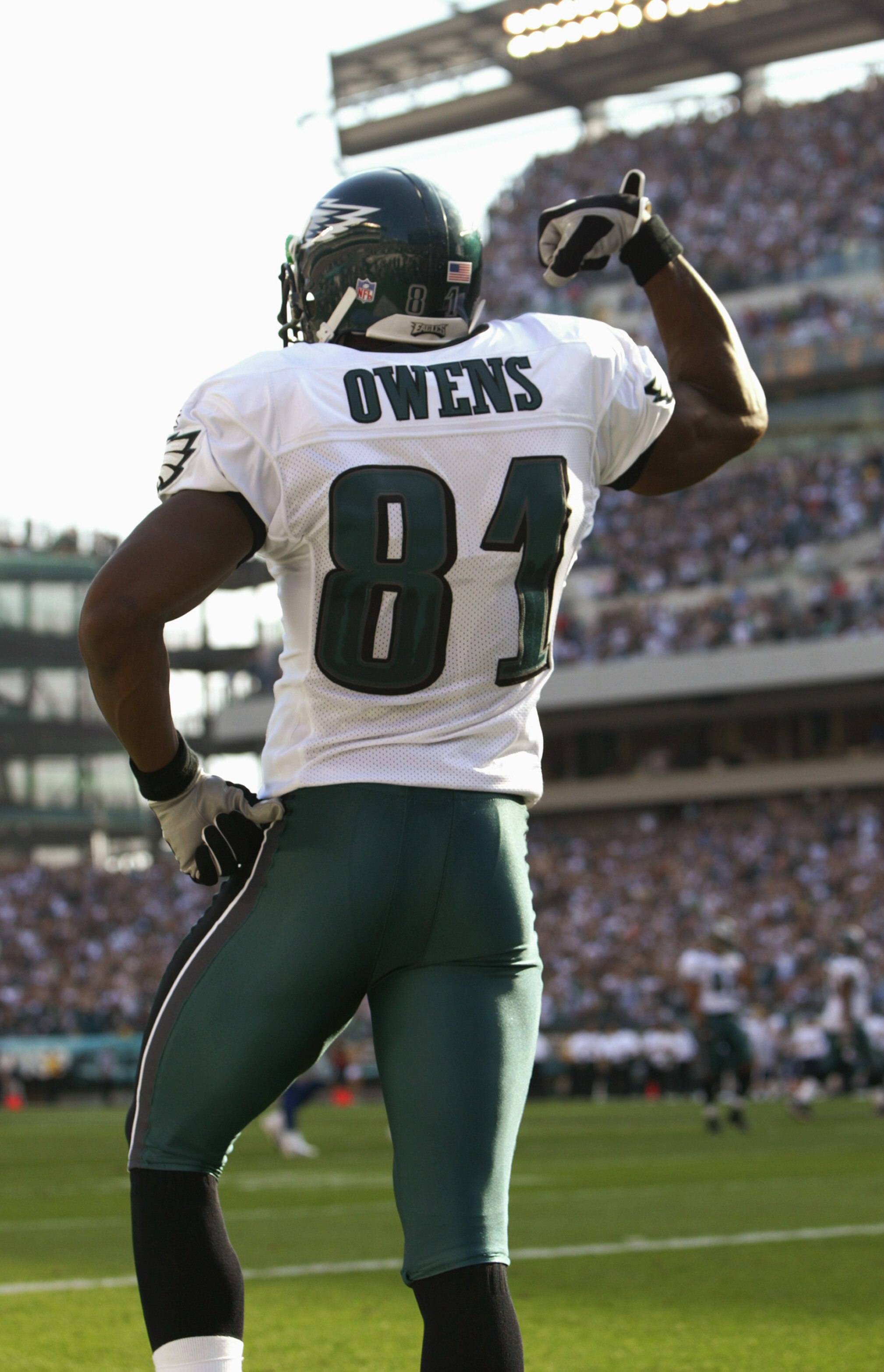 PHILADELPHIA - SEPTEMBER 12:  Terrell Owens of the Philadelphia Eagles celebrates his 20 yard touchdown reception in the corner of the end zone against the New York Giants at 6:24 of the first quarter of the game on September 12, 2004 at Lincoln Financial
