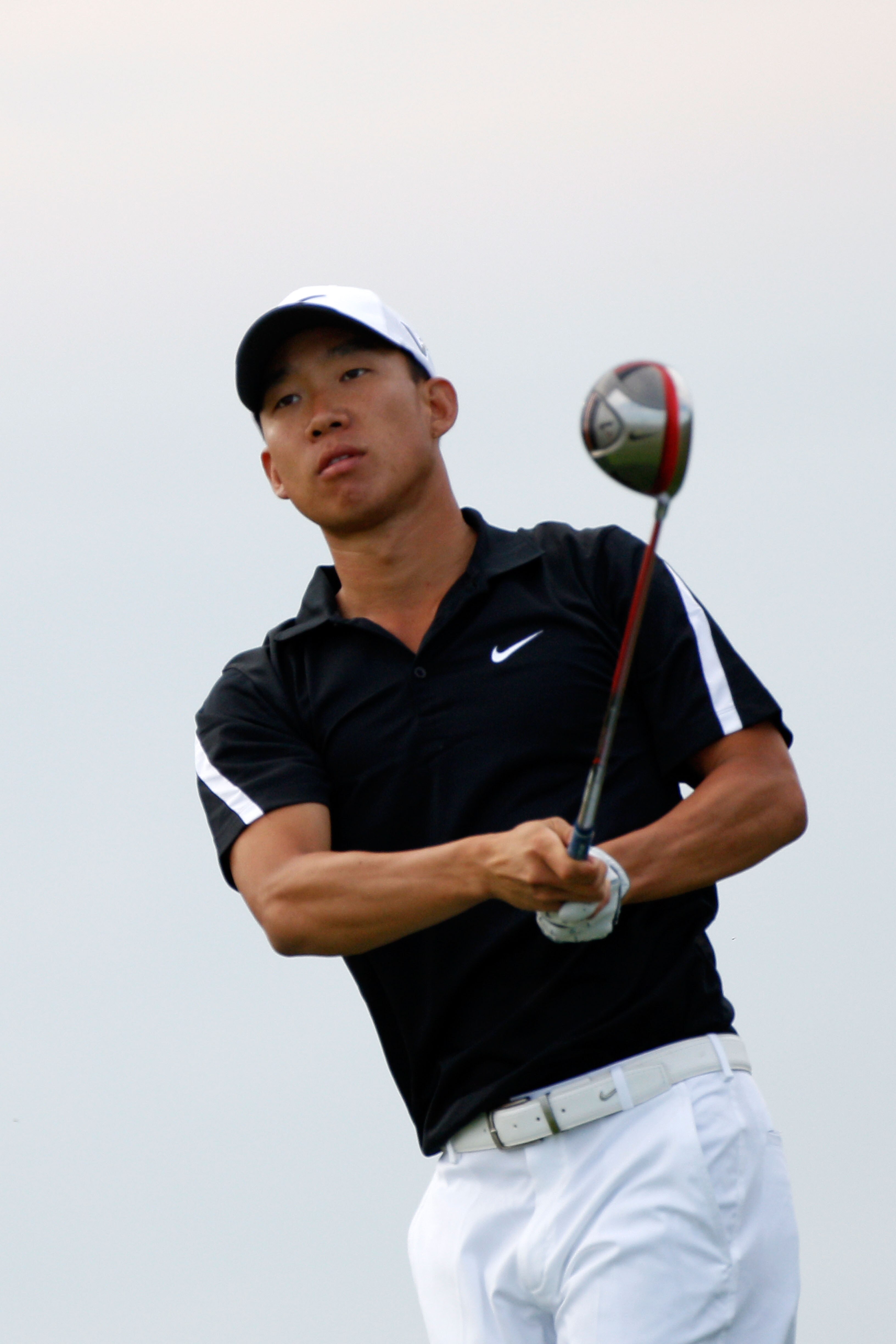 KOHLER, WI - AUGUST 14:  Anthony Kim watches his tee shot on the 11th hole during the continuation of the second round of the 92nd PGA Championship on the Straits Course at Whistling Straits on August 14, 2010 in Kohler, Wisconsin.  (Photo by Sam Greenwoo