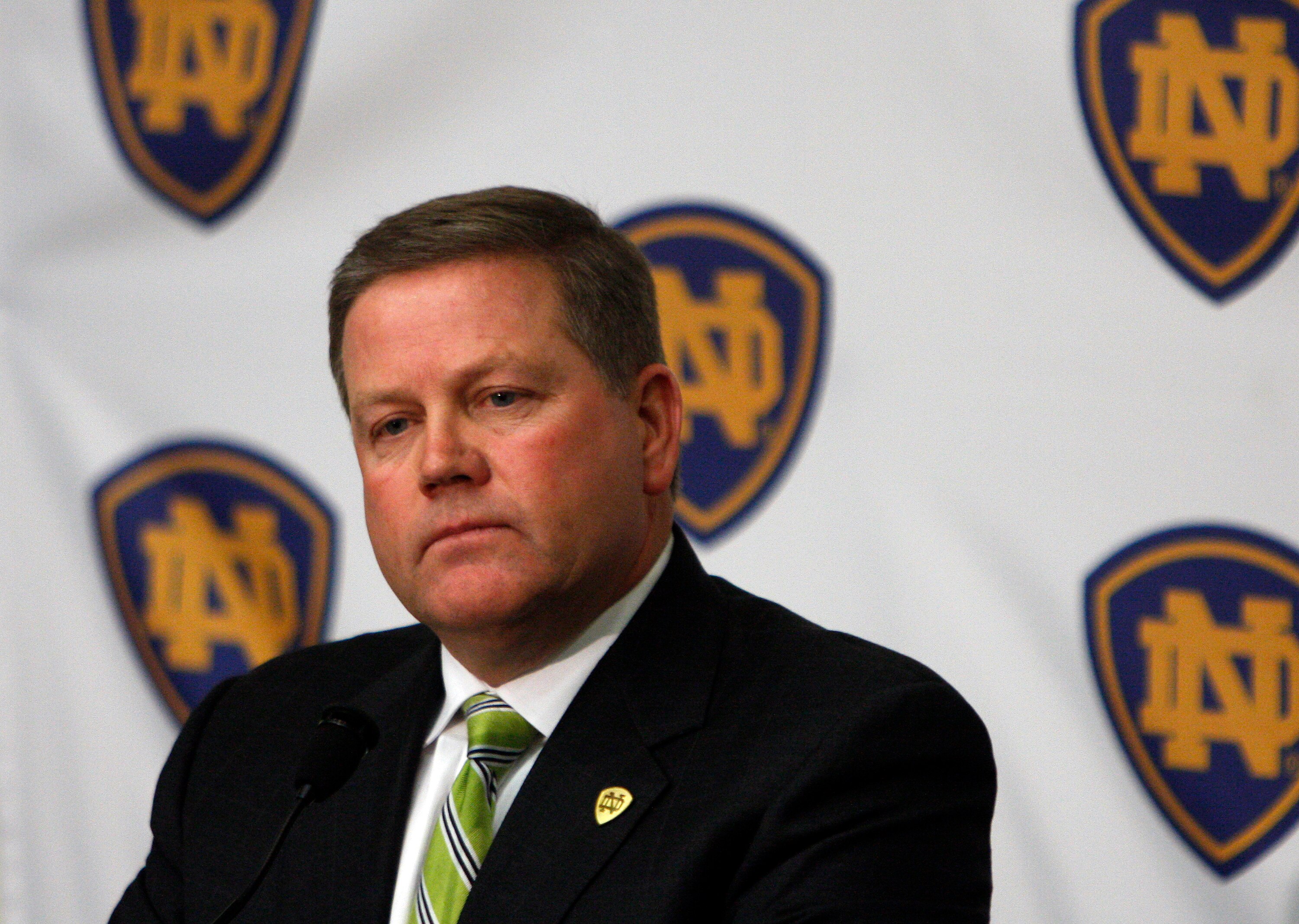 SOUTH BEND, IN - DECEMBER 11: Brian Kelly attends a press conference where he was named new football head coach at Notre Dame University on December 11, 2009 in South Bend, Indiana.  Kelly most recently led the University of Cincinnati to two consecutive