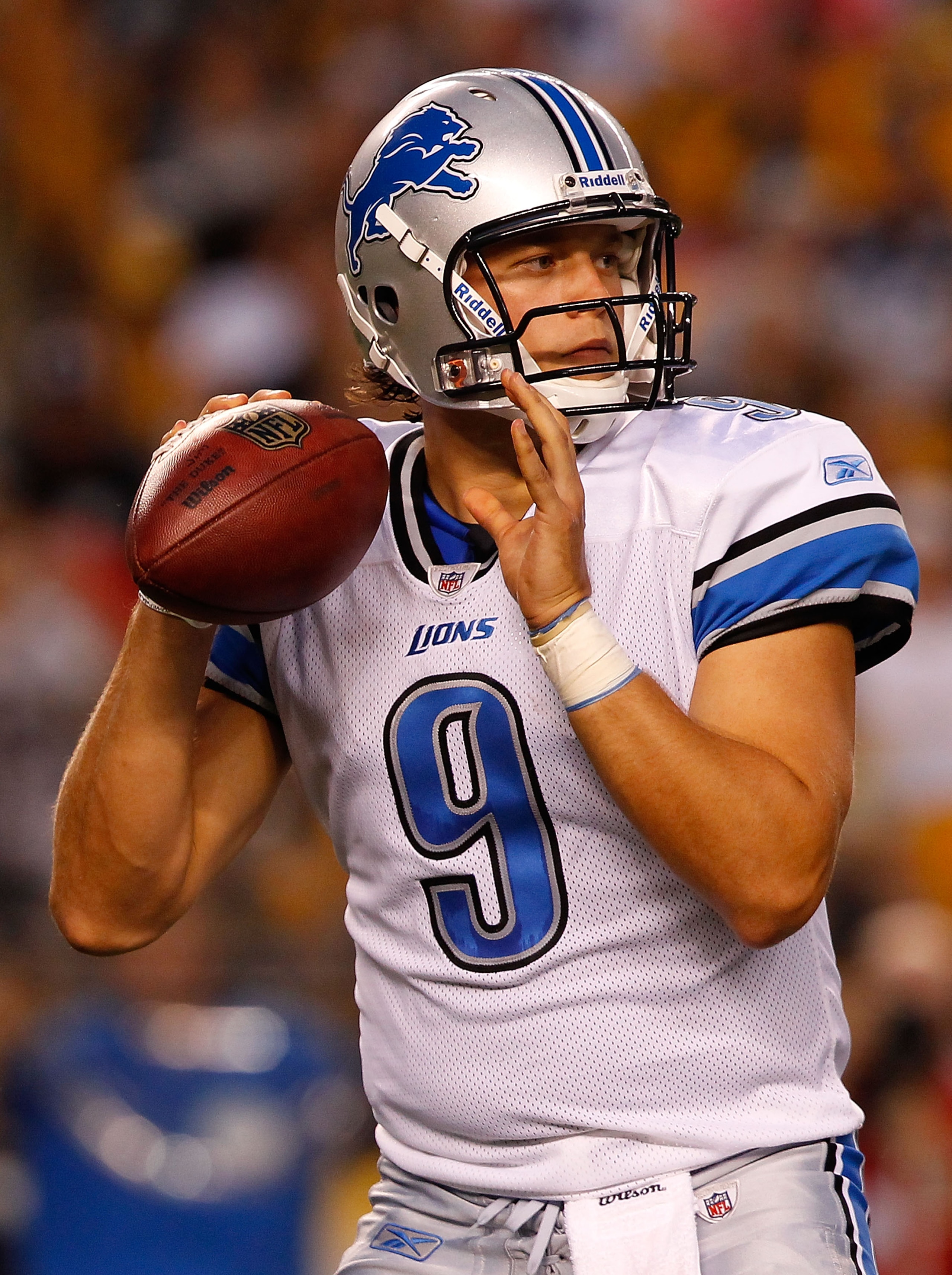PITTSBURGH - AUGUST 14:  Matthew Stafford #9 of the Detroit Lions drops back to pass against the Pittsburgh Steelers during the preseason game on August 14, 2010 at Heinz Field in Pittsburgh, Pennsylvania. Steelers won 23-7.  (Photo by Jared Wickerham/Get