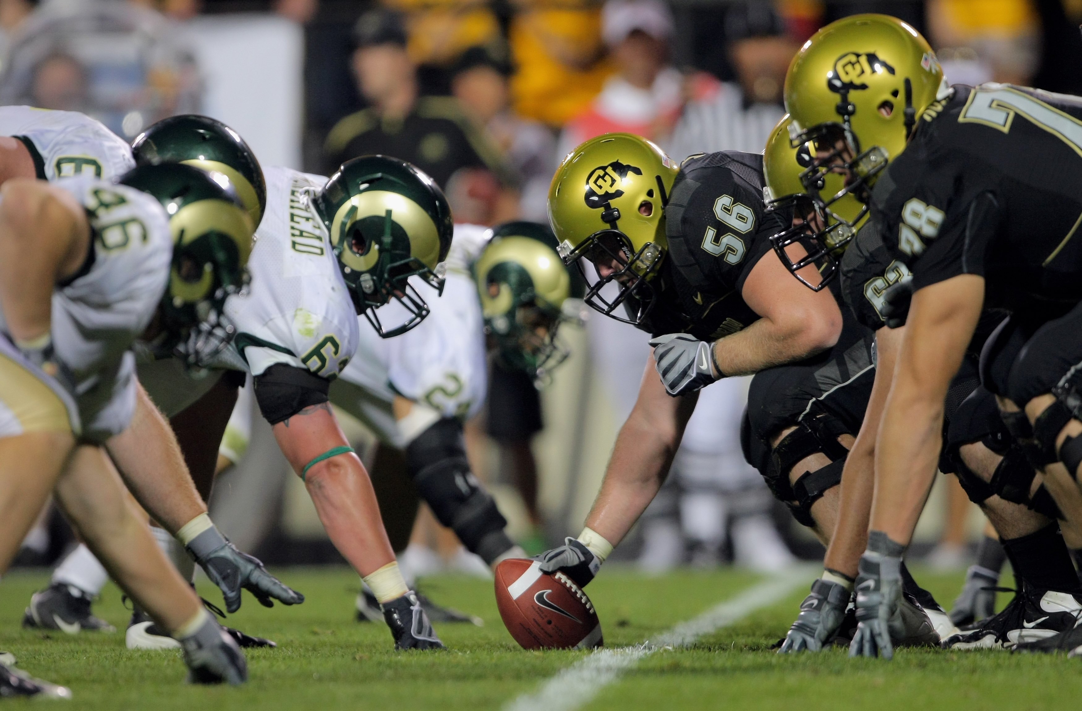 BOULDER, CO - SEPTEMBER 06:  Center Keenan Stevens #56 of the Colorado Buffaloes prepares to snap the ball on the line of scrimmage against the Colorado State Rams at Folsom Field on September 6, 2009 in Boulder, Colorado. The Rams defeated the Buffaloes 