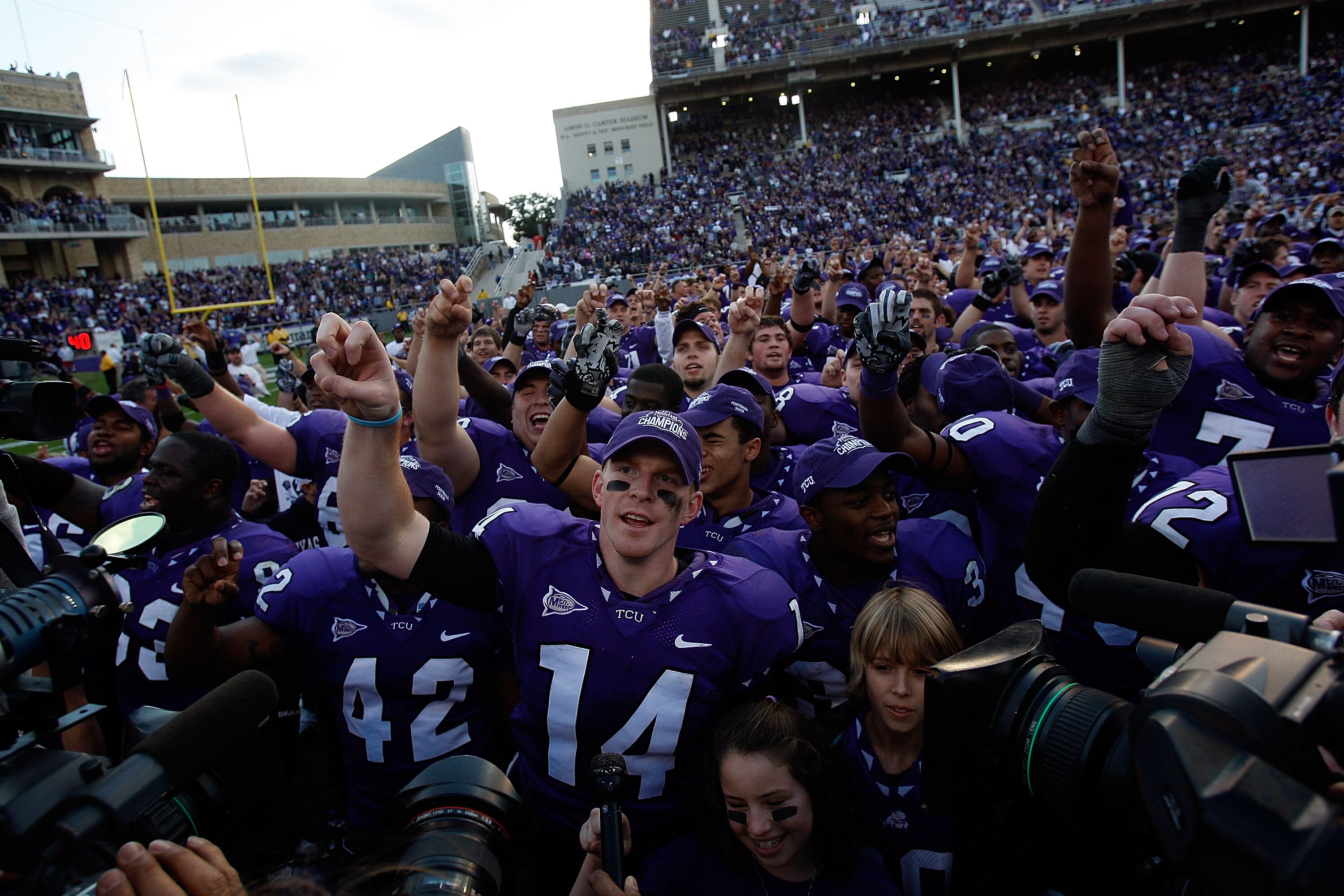 FORT WORTH, TX - NOVEMBER 28:  Quarterback Andy Dalton #14 of the TCU Horned Frogs celebrates a win against the New Mexico Lobos at Amon G. Carter Stadium on November 28, 2009 in Fort Worth, Texas.  (Photo by Ronald Martinez/Getty Images)