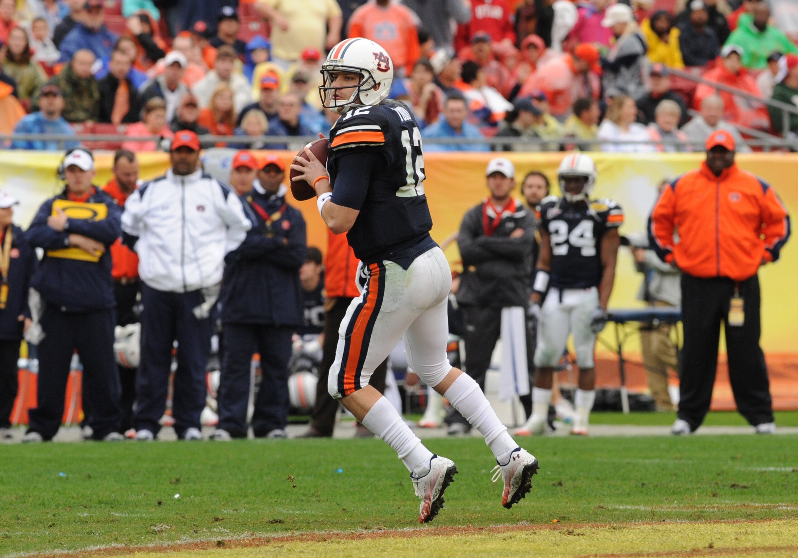 TAMPA, FL - JANUARY 1: Quarterback Chris Todd #12 of the Auburn Tigers sets to pass against the Northwestern Wildcats in the Outback Bowl January 1, 2010 at Raymond James Stadium in Tampa, Florida.  (Photo by Al Messerschmidt/Getty Images)