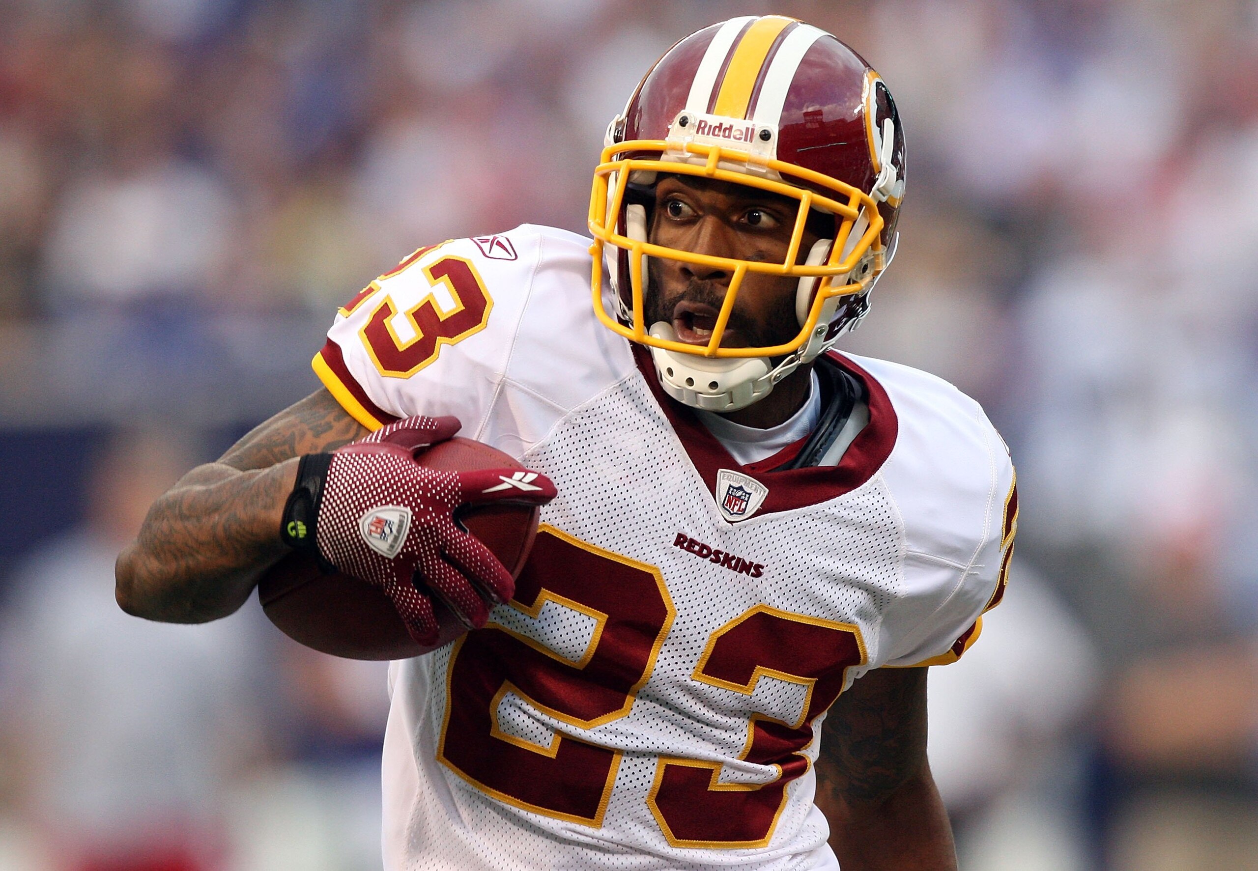 EAST RUTHERFORD, NJ - SEPTEMBER 13: DeAngelo Hall #23 of the Washington Redskins runs the ball after an interception against the New York Giants on September 13, 2009 at Giants Stadium in East Rutherford, New Jersey. (Photo by Jim McIsaac/Getty Images) EAST RUTHERFORD, NJ - SEPTEMBER 13: DeAngelo Hall #23 of the Washington Redskins runs the ball after an interception against the New York Giants on September 13, 2009 at Giants Stadium in East Rutherford, New Jersey. (Photo by Jim McIsaac/Getty Images)