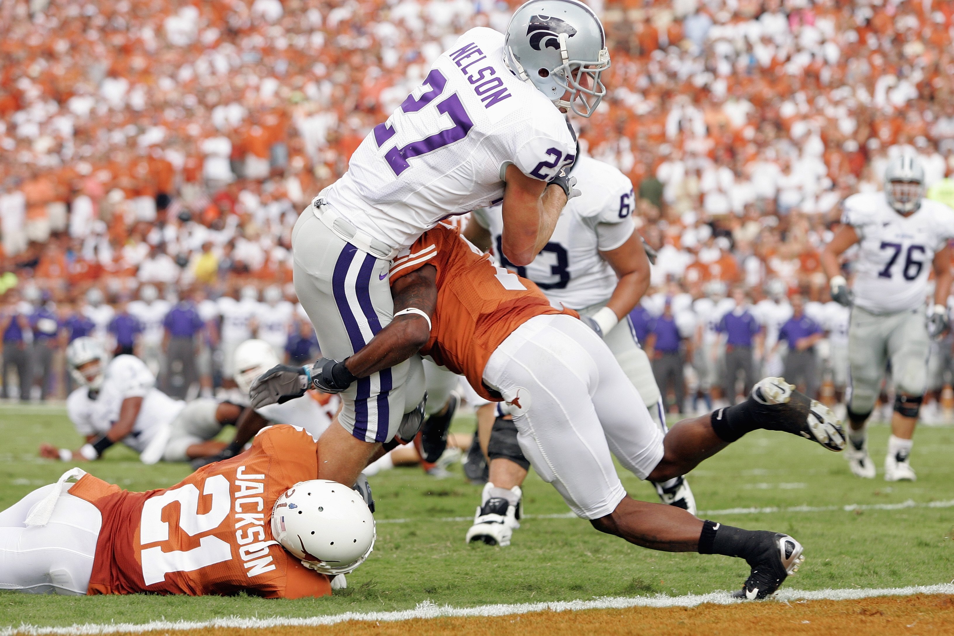 AUSTIN, TX - SEPTEMBER 29: Jordy Nelson #27 of the Kansas State Wildcats leaps for the endzone during the game against the Texas Longhorns on September 29, 2007 at Darrell K Royal-Texas Memorial Stadium in Austin, Texas.  Kansas State won 41-21.  (Photo b