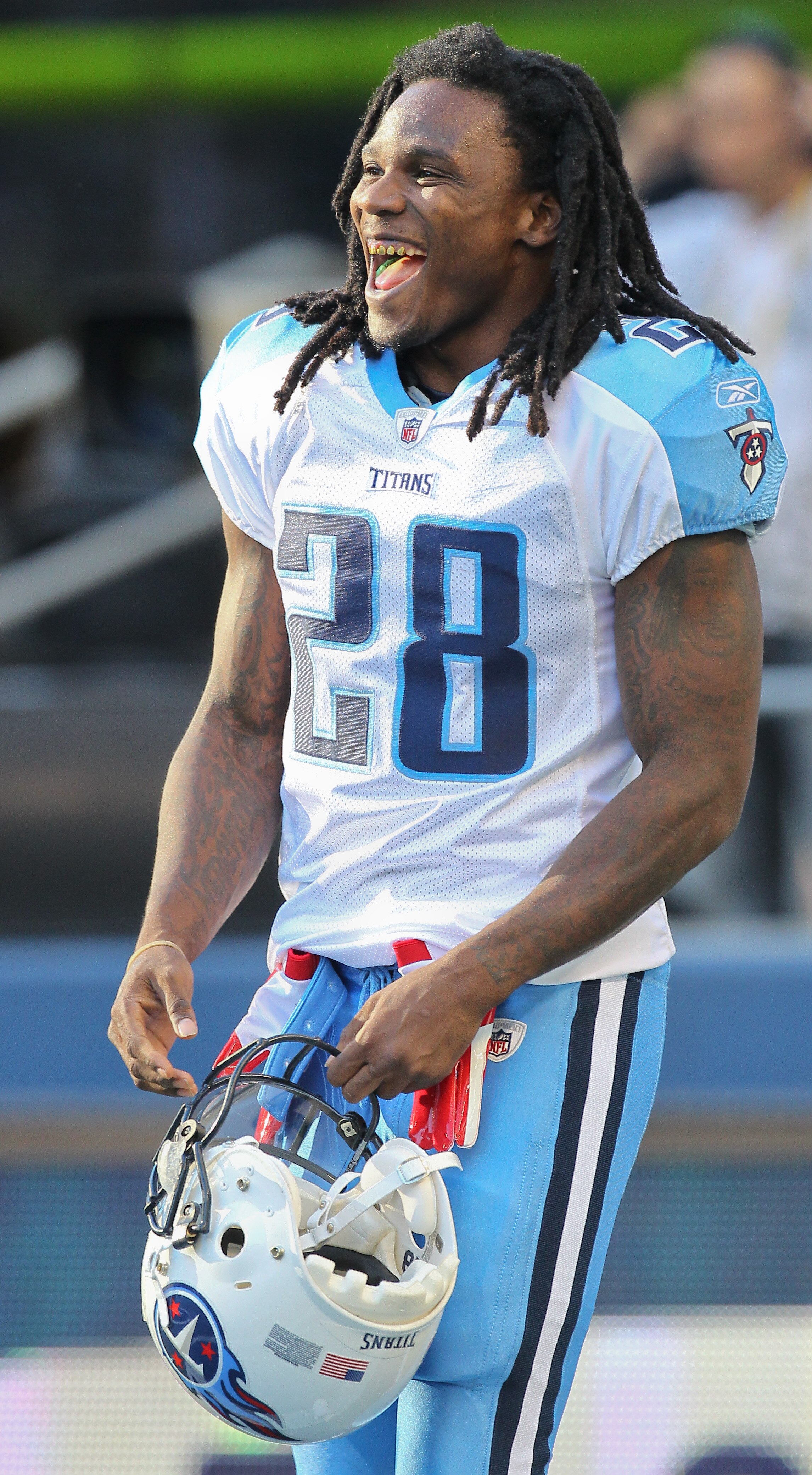 SEATTLE - AUGUST 14:  Running back Chris Johnson #28 of the Tennessee Titans smiles prior to the preseason game against the Seattle Seahawks at Qwest Field on August 14, 2010 in Seattle, Washington. (Photo by Otto Greule Jr/Getty Images)