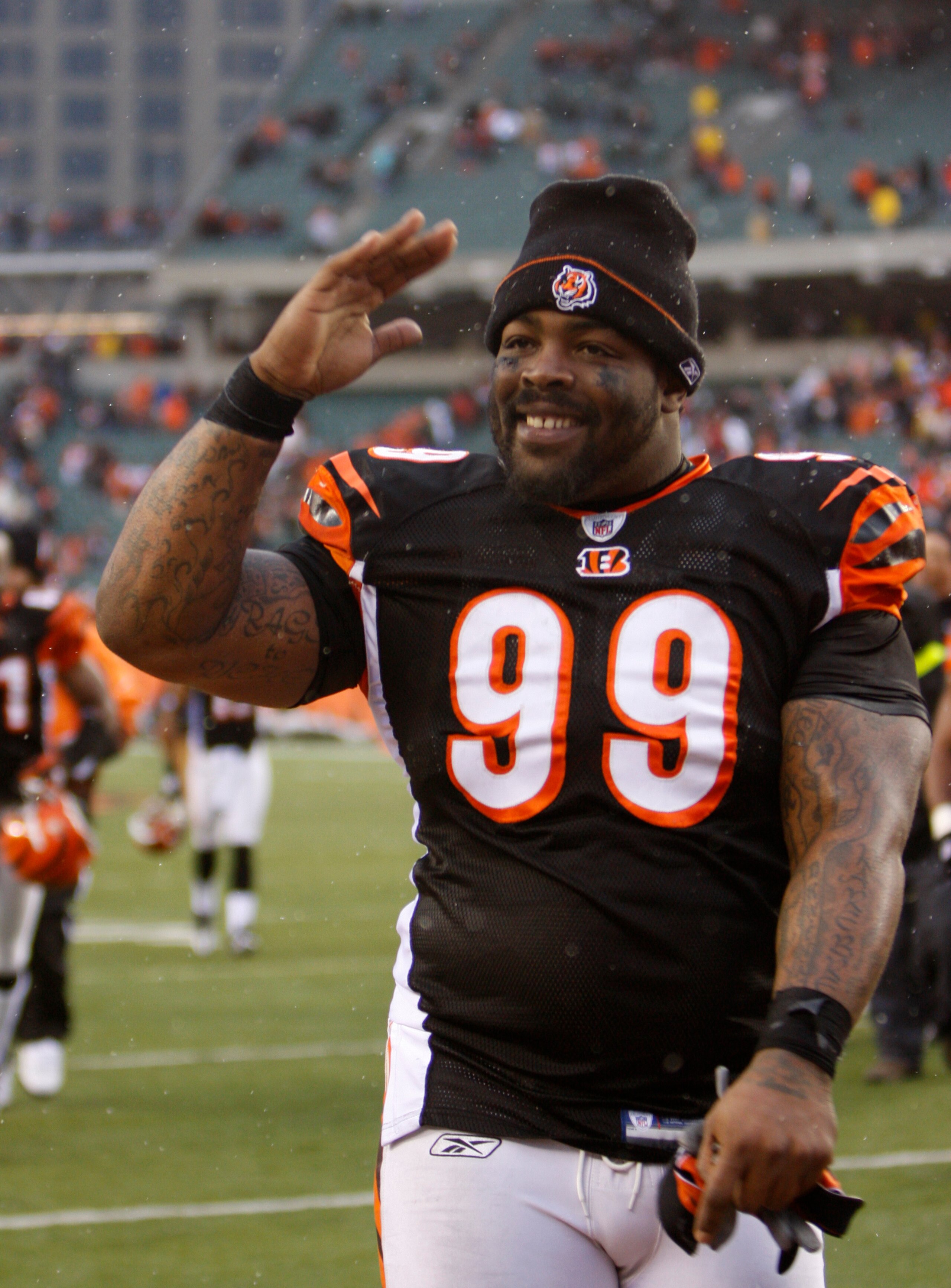 CINCINNATI - DECEMBER 27:  Tank Johnson #99 of the Cincinnati Bengals celebrates defeating the Kansas City Chiefs in their NFL game at Paul Brown Stadium December 27, 2009 in Cincinnati, Ohio.    (Photo by John Sommers II/Getty Images)