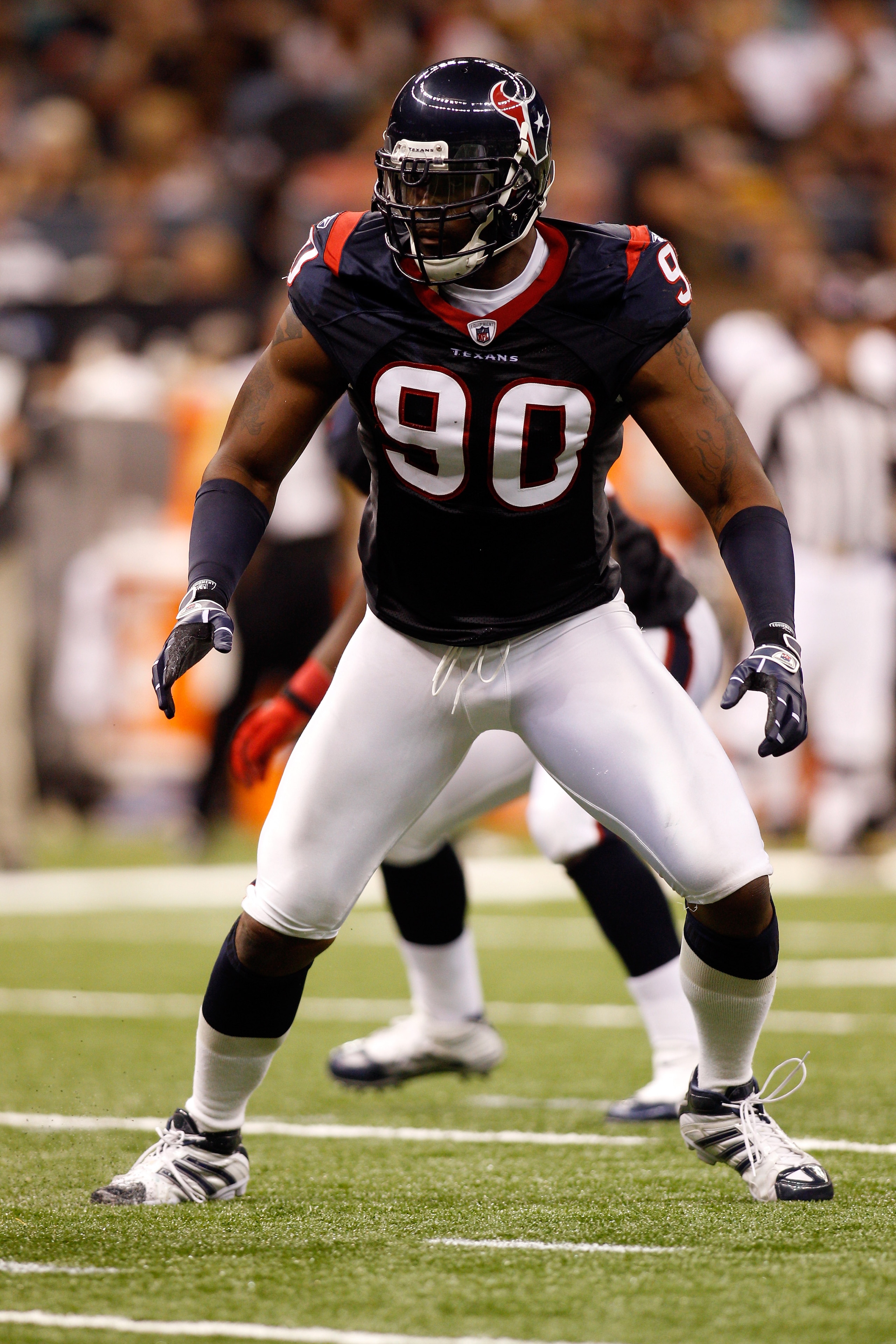 NEW ORLEANS - AUGUST 21:  Mario Williams #90 of the Houston Texans in action during the game against the New Orleans Saints at the Louisiana Superdome on August 21, 2010 in New Orleans, Louisiana.  (Photo by Chris Graythen/Getty Images)