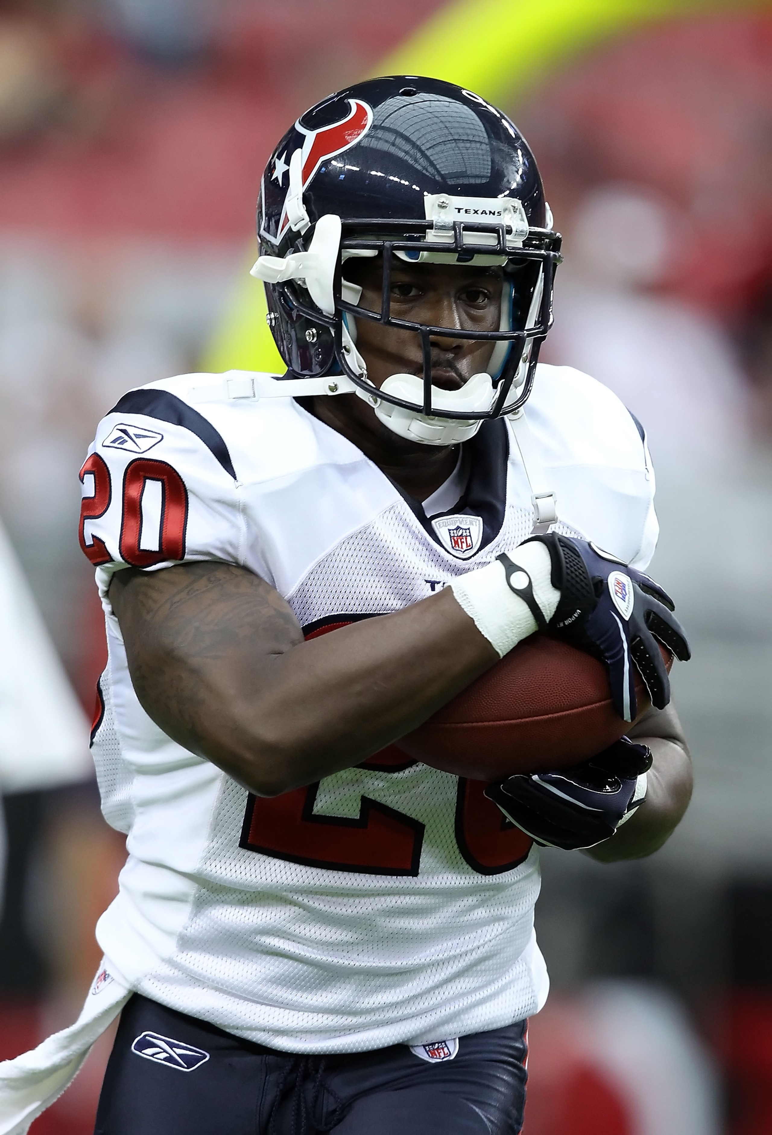 GLENDALE, AZ - AUGUST 14:  Runningback Steve Slaton #20 of the Houston Texans carries the ball during warm ups to the preseason NFL game against the Arizona Cardinals at the University of Phoenix Stadium on August 14, 2010 in Glendale, Arizona.  The Cardi