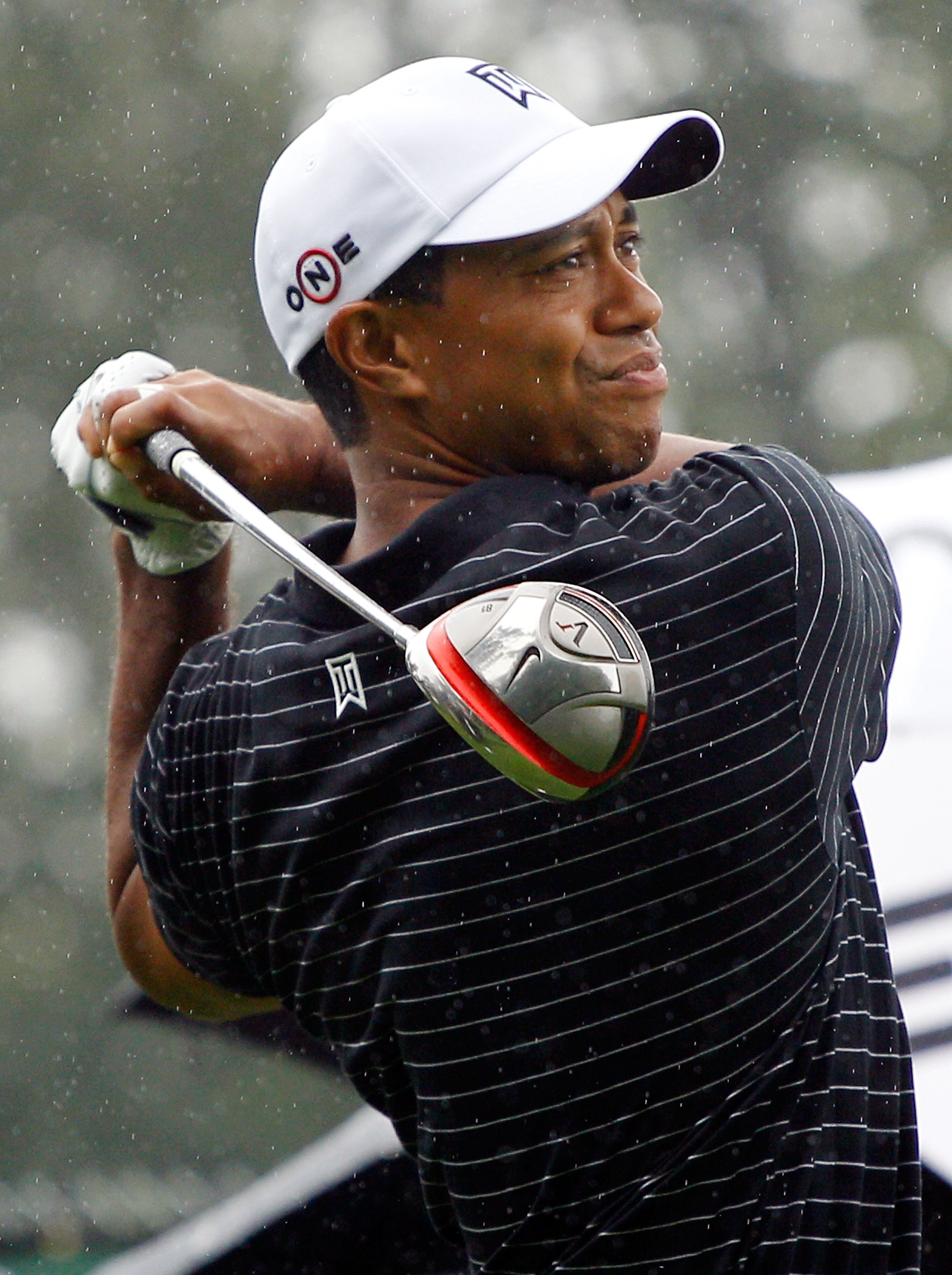 PARAMUS, NJ - AUGUST 25:  Tiger Woods watches a shot during the pro-am prior to the start of The Barclays at the Ridgewood Country Club on August 25, 2010 in Paramus, New Jersey.  (Photo by Scott Halleran/Getty Images)