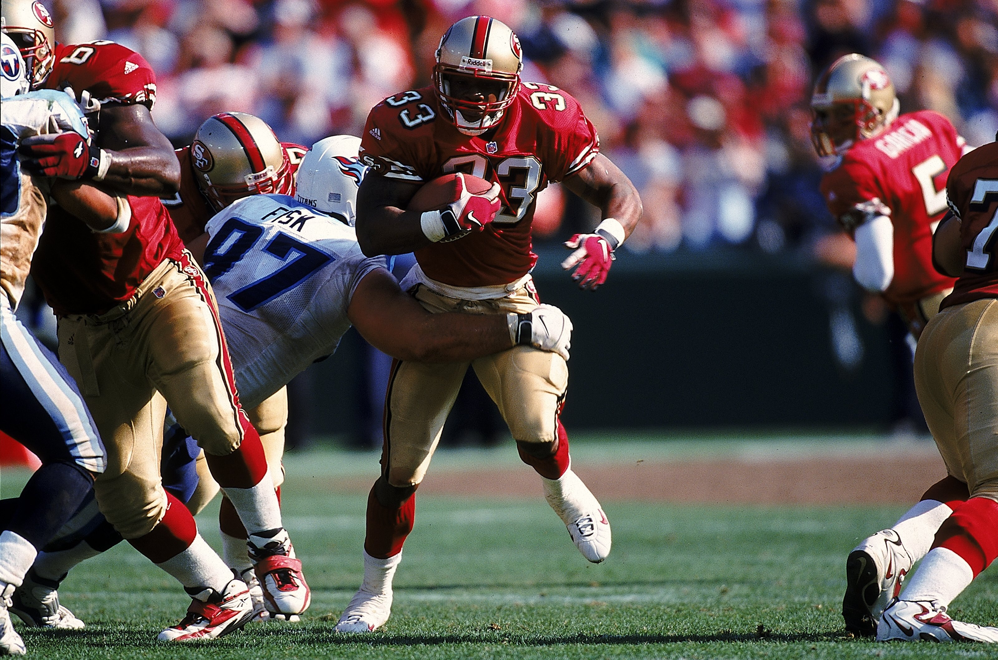 3 Oct 1999: Lawrence Phillips #33 of the San Francisco 49ers carries the ball during a game against the Tennessee Titans at 3Com Park in San Francisco, California. The 49ers defeated the Titans 24-22.