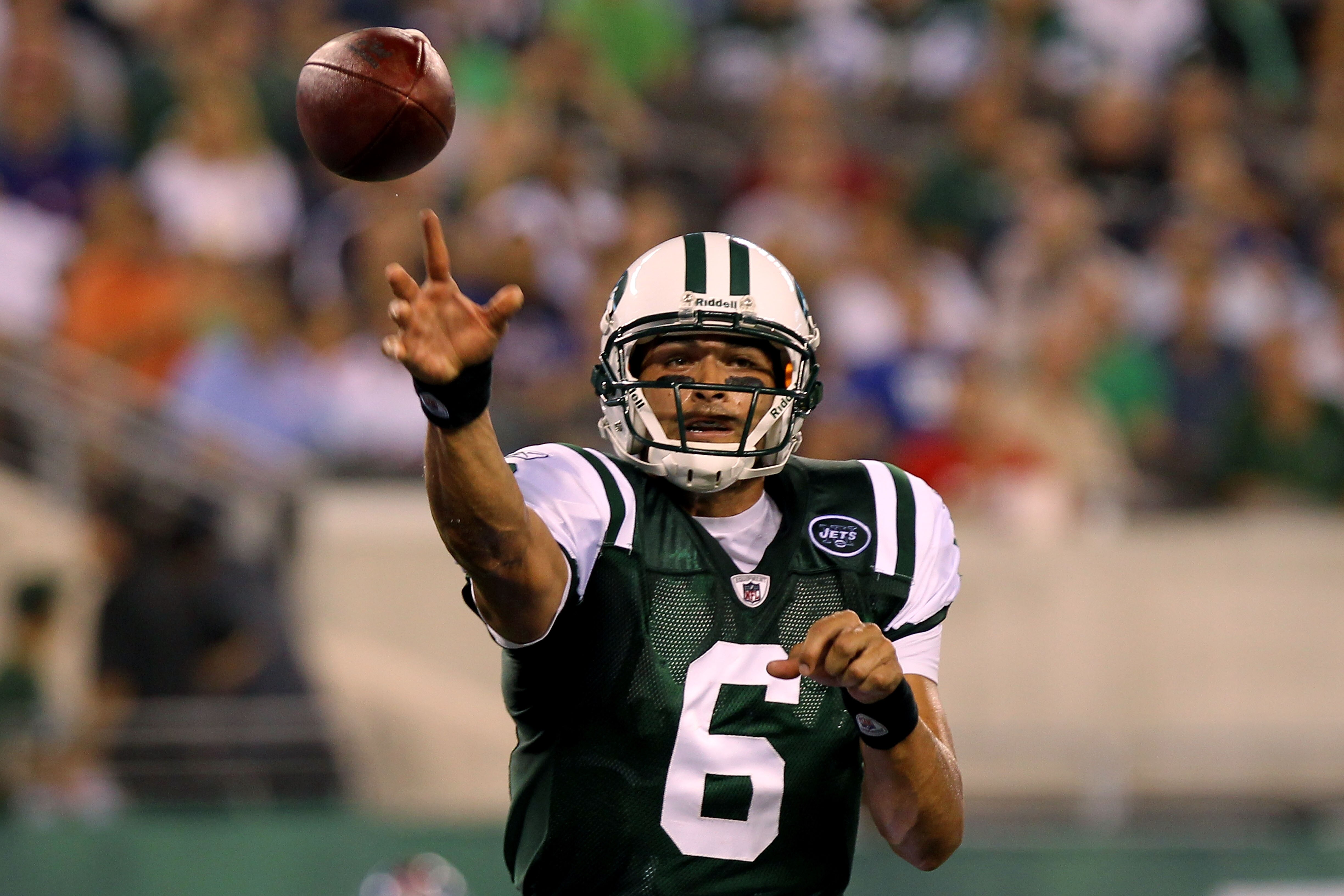 EAST RUTHERFORD, NJ - AUGUST 16:  Quarterback Mark Sanchez #6 of the New York Jets passes against the New York Giants during their game at New Meadowlands Stadium on August 16, 2010 in East Rutherford, New Jersey.  (Photo by Nick Laham/Getty Images)