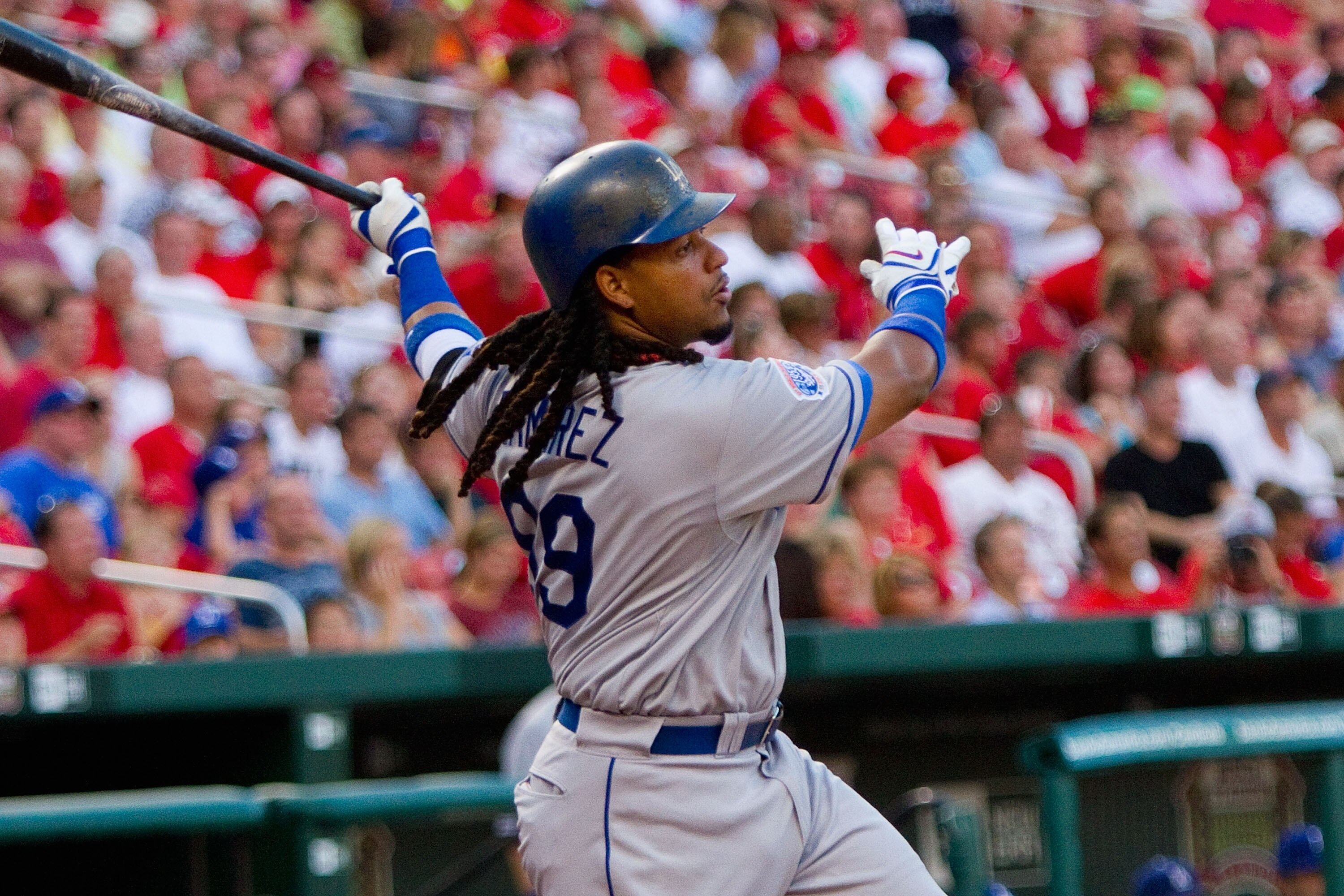 ST. LOUIS - JULY 15:  Manny Ramierez #99 of the Los Angeles Dodgers bats against the St. Louis Cardinals at Busch Stadium on July 15, 2010 in St. Louis, Missouri.  (Photo by Dilip Vishwanat/Getty Images)