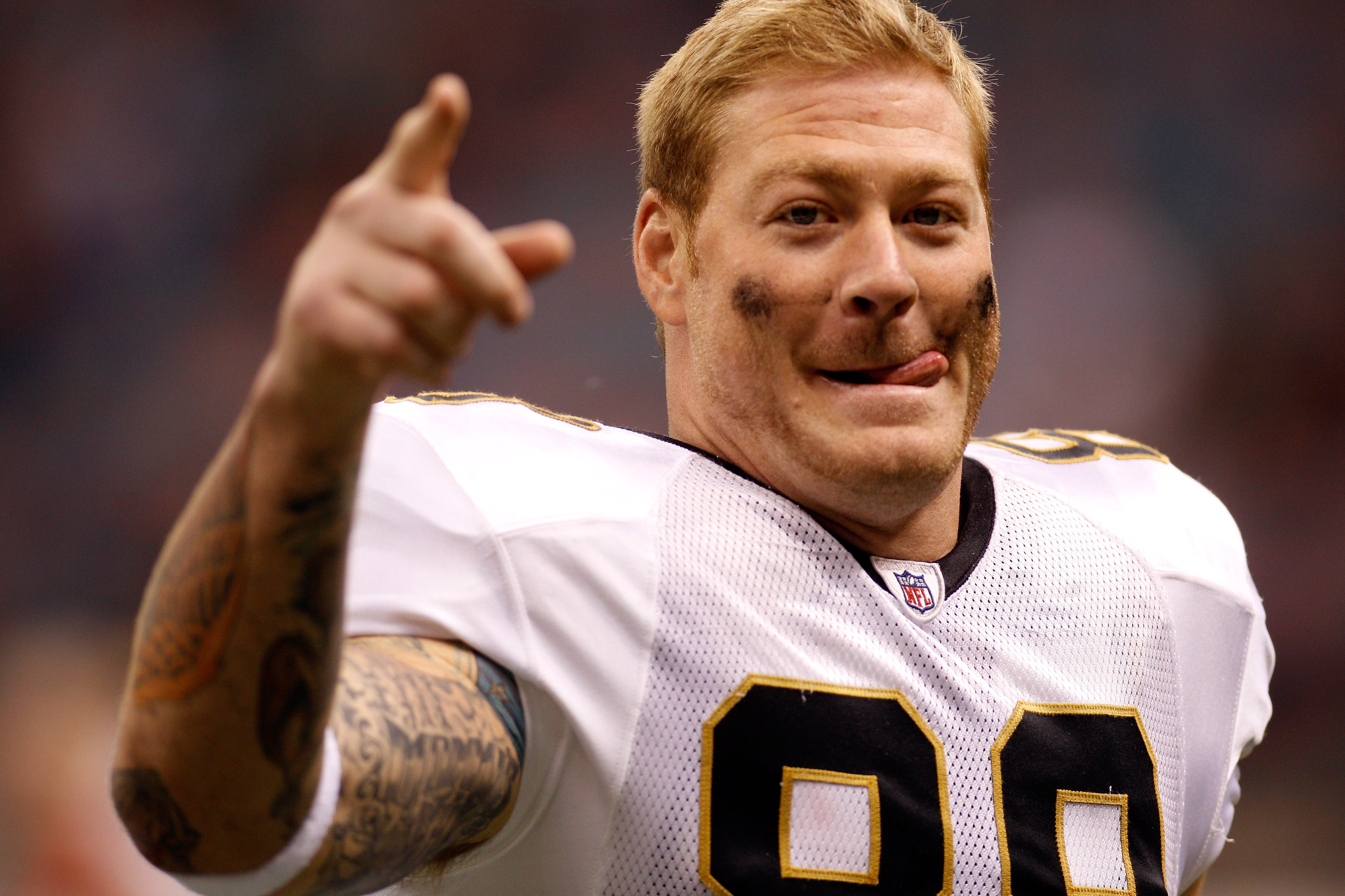 NEW ORLEANS - AUGUST 21:  Jeremy Scockey #88 of the New Orleans Saints celebrates after defeating the Houston Texans at the Louisiana Superdome on August 21, 2010 in New Orleans, Louisiana.  (Photo by Chris Graythen/Getty Images)