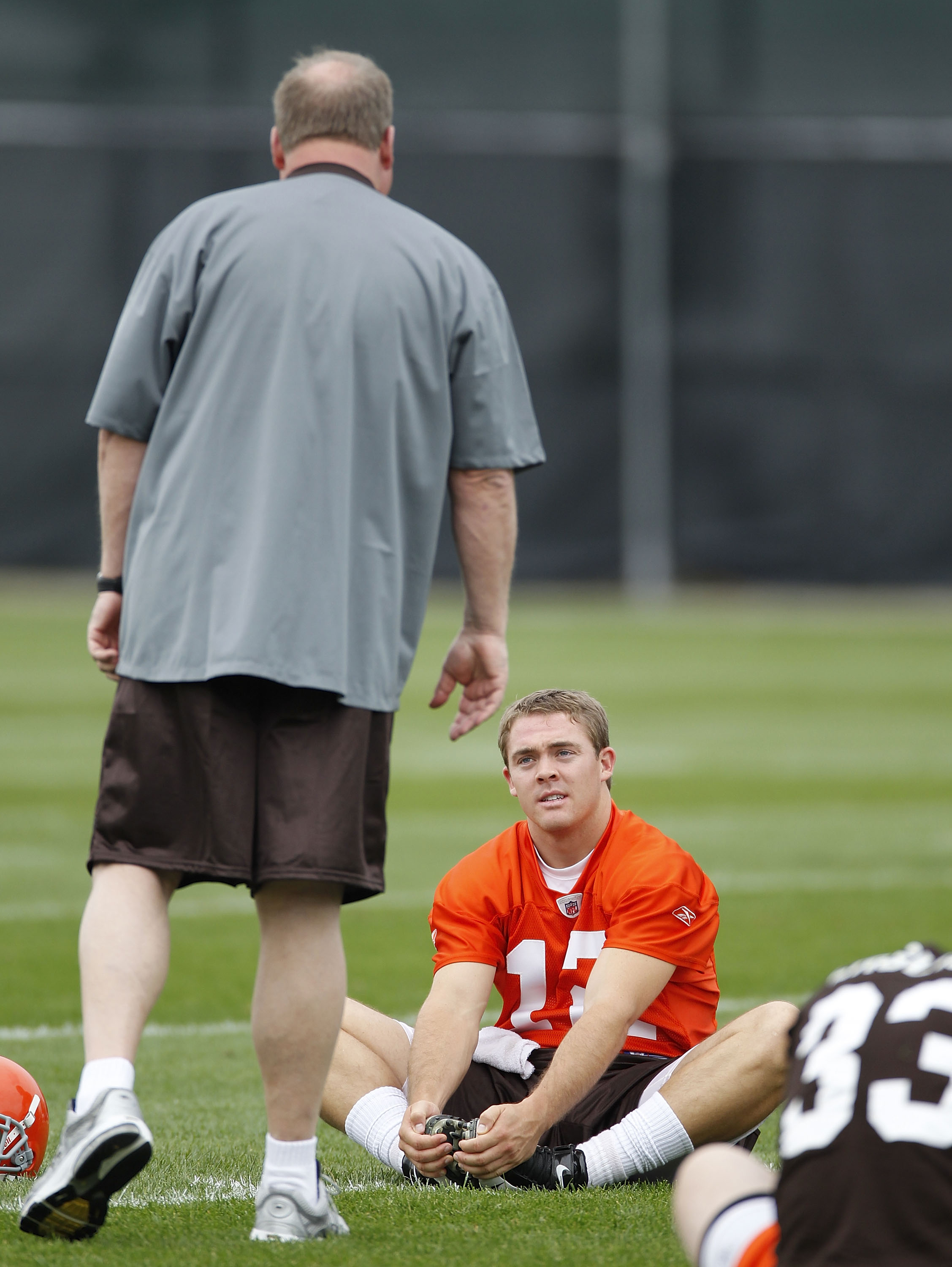 BEREA, OH - MAY 01:  Colt McCoy #12 of the Cleveland Browns talks with team president Mike Holmgren during rookie mini camp at the Cleveland Browns Training and Administrative Complex on May 1, 2010 in Berea, Ohio.  (Photo by Gregory Shamus/Getty Images)
