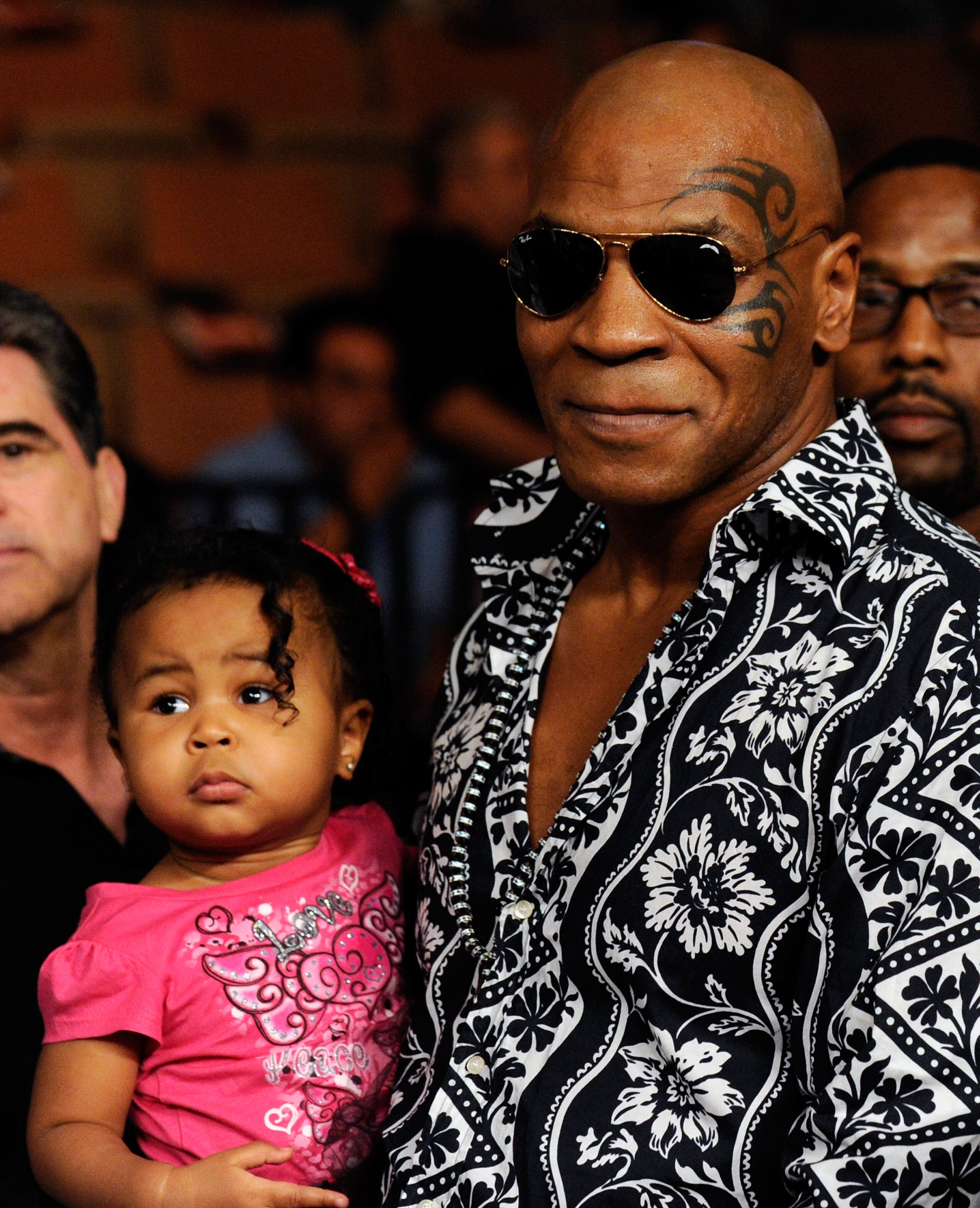 LAS VEGAS - JULY 31: Mike Tyson holds his daughter Milan as he arrives at the Juan Manuel Marquez and Juan Diaz bout at the Mandalay Bay Events Center July 31, 2010 in Las Vegas, Nevada. (Photo by Ethan Miller/Getty Images) LAS VEGAS - JULY 31: Mike Tyson holds his daughter Milan as he arrives at the Juan Manuel Marquez and Juan Diaz bout at the Mandalay Bay Events Center July 31, 2010 in Las Vegas, Nevada. (Photo by Ethan Miller/Getty Images)
