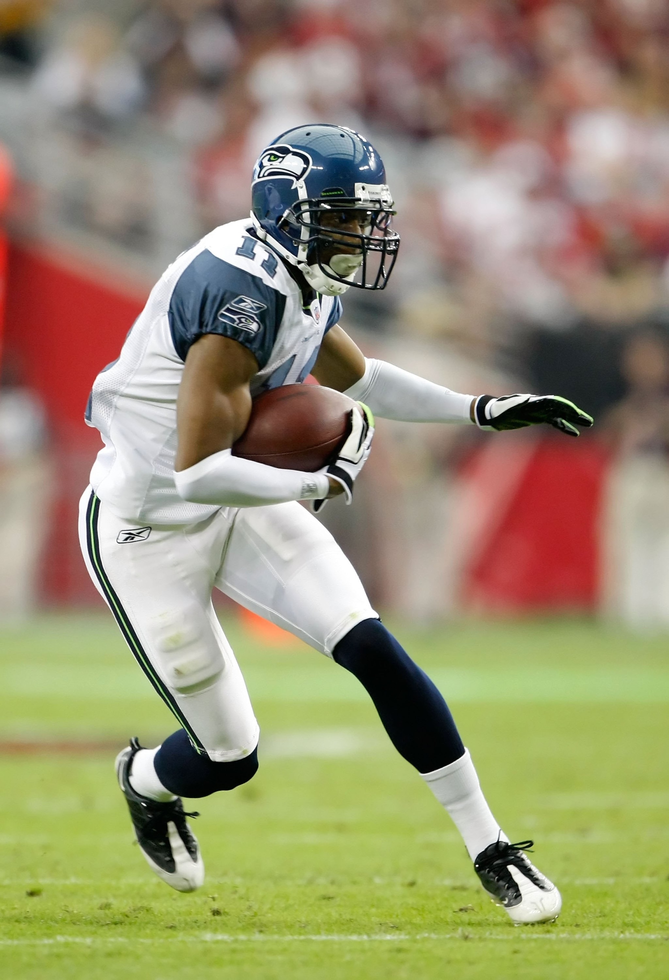 GLENDALE, AZ - NOVEMBER 15:  Deon Butler #11 of the Seattle Seahawks carries the ball against the Arizona Cardinals at University of Phoenix Stadium on November 15, 2009 in Glendale, Arizona.  (Photo by Jeff Gross/Getty Images)