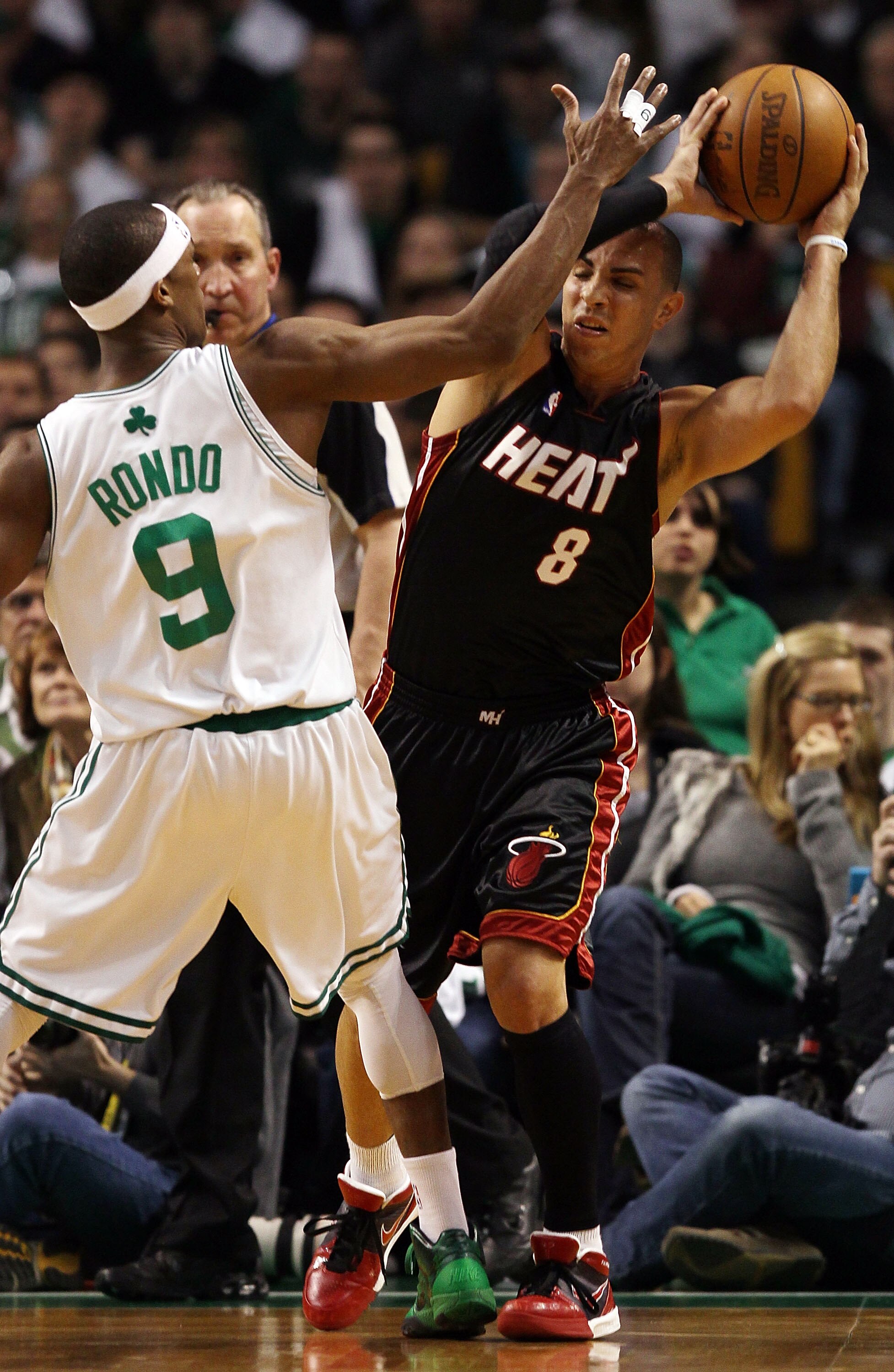 BOSTON - APRIL 17:  Carlos Arroyo #8 of the Miami Heat tries to pass as Rajon Rondo #9  of the Boston Celtics defends during Game One of the Eastern Conference Quarterfinals of the 2010 NBA playoffs at the TD Garden on April 17, 2010 in Boston, Massachuse
