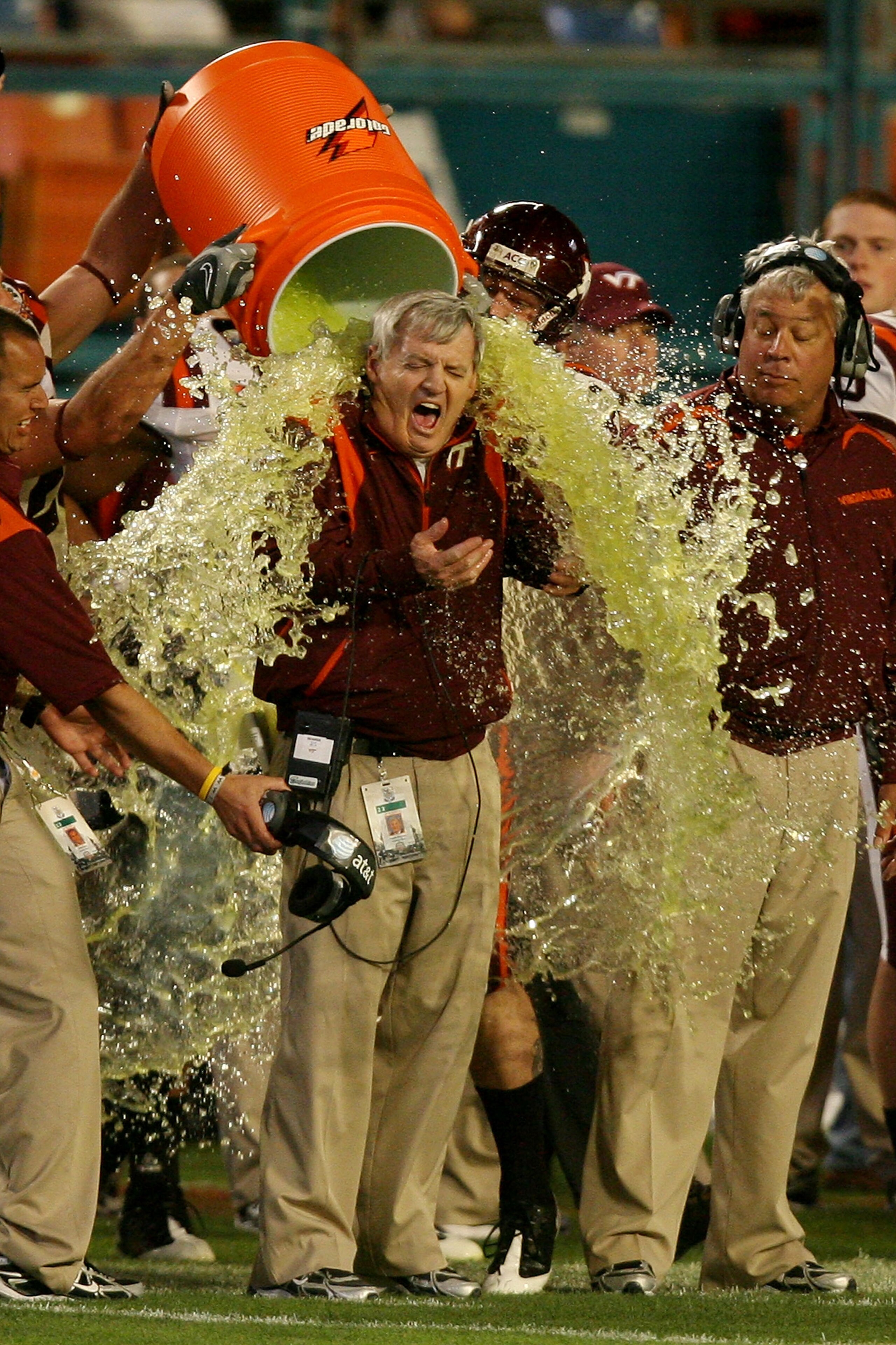 MIAMI - JANUARY 01:  Head coach Frank Beamer of the Virginia Tech Hokies gets gatorade dump on him by his players on their way to winning against the Cincinnati Bearcats during the FedEx Orange Bowl at Dolphin Stadium on January 1, 2009 in Miami, Florida.
