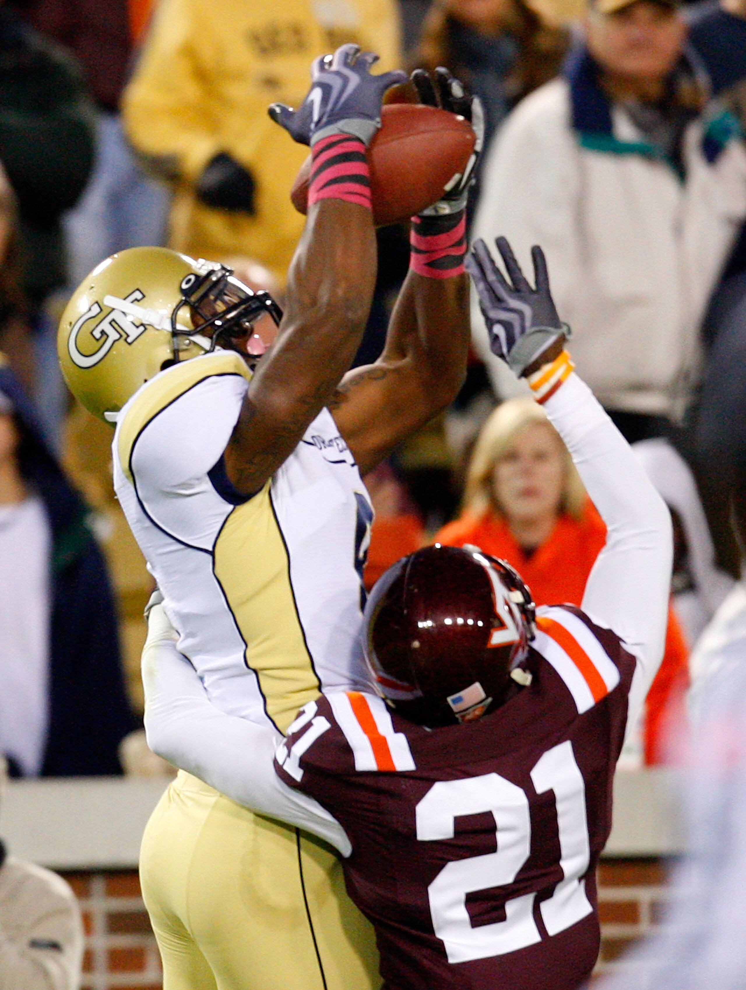 ATLANTA - OCTOBER 17:  Demaryius Thomas #8 of the Georgia Tech Yellow pulls in a reception against Rashad Carmichael #21 of the Virginia Tech Hokies Jackets at Bobby Dodd Stadium on October 17, 2009 in Atlanta, Georgia.  (Photo by Kevin C. Cox/Getty Image