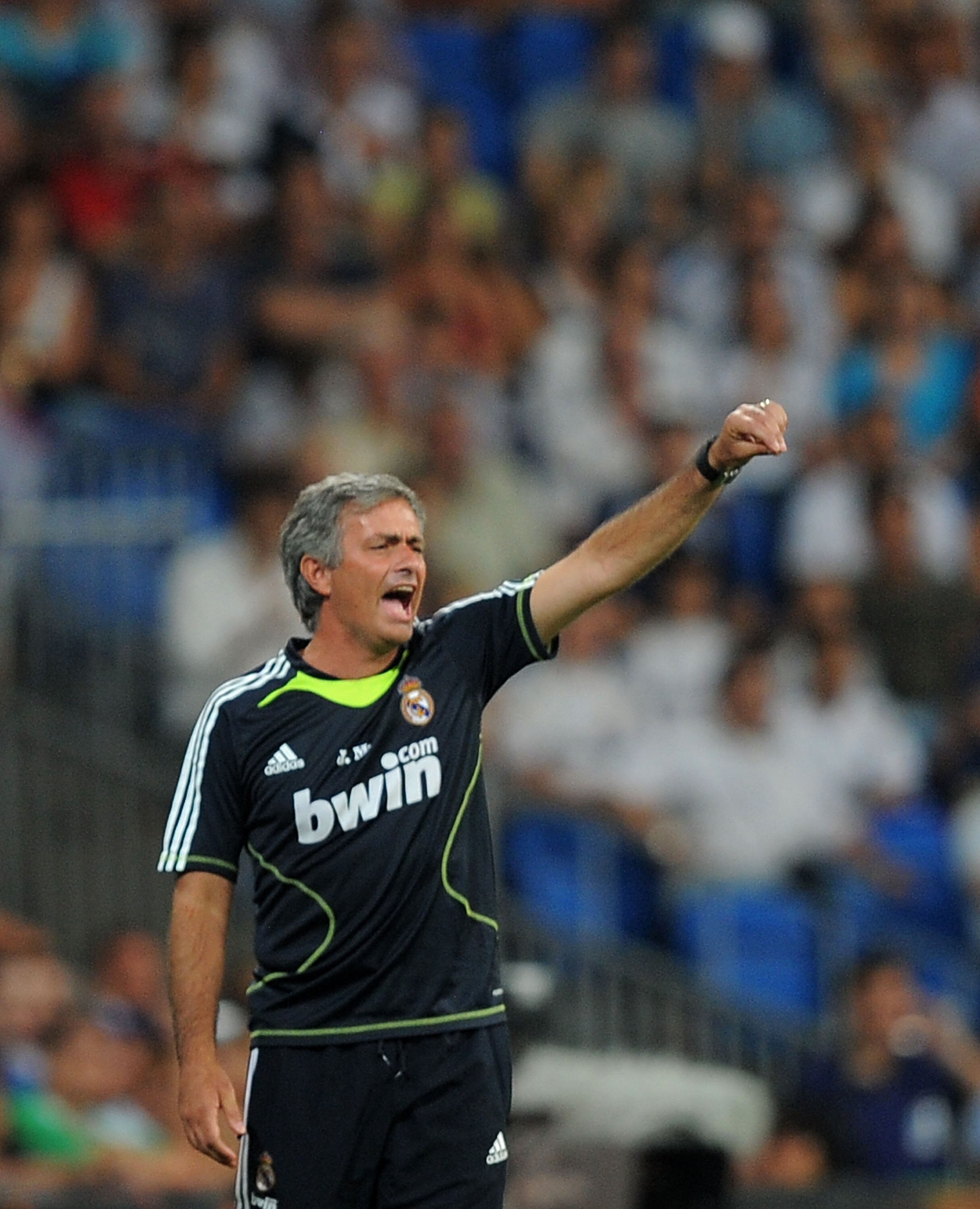 MADRID, SPAIN - AUGUST 24:  Real Madrid's new manager Jose Mourinho directs his team during the Santiago Bernabeu Trophy match between Real Madrid and Penarol at the Santiago Bernabeu stadium on August 24, 2010 in Madrid, Spain.  (Photo by Denis Doyle/Get